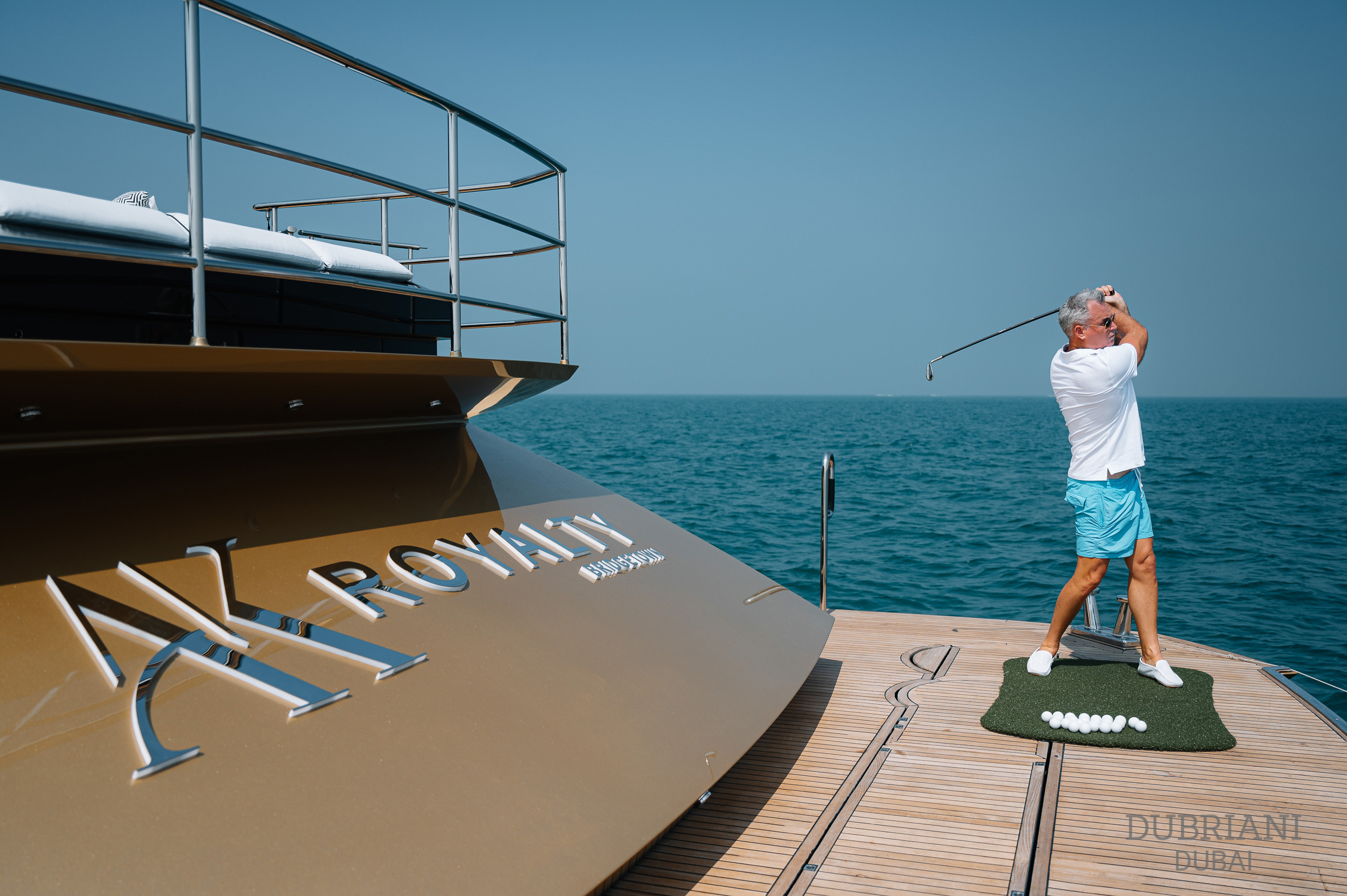 golfing on a yacht