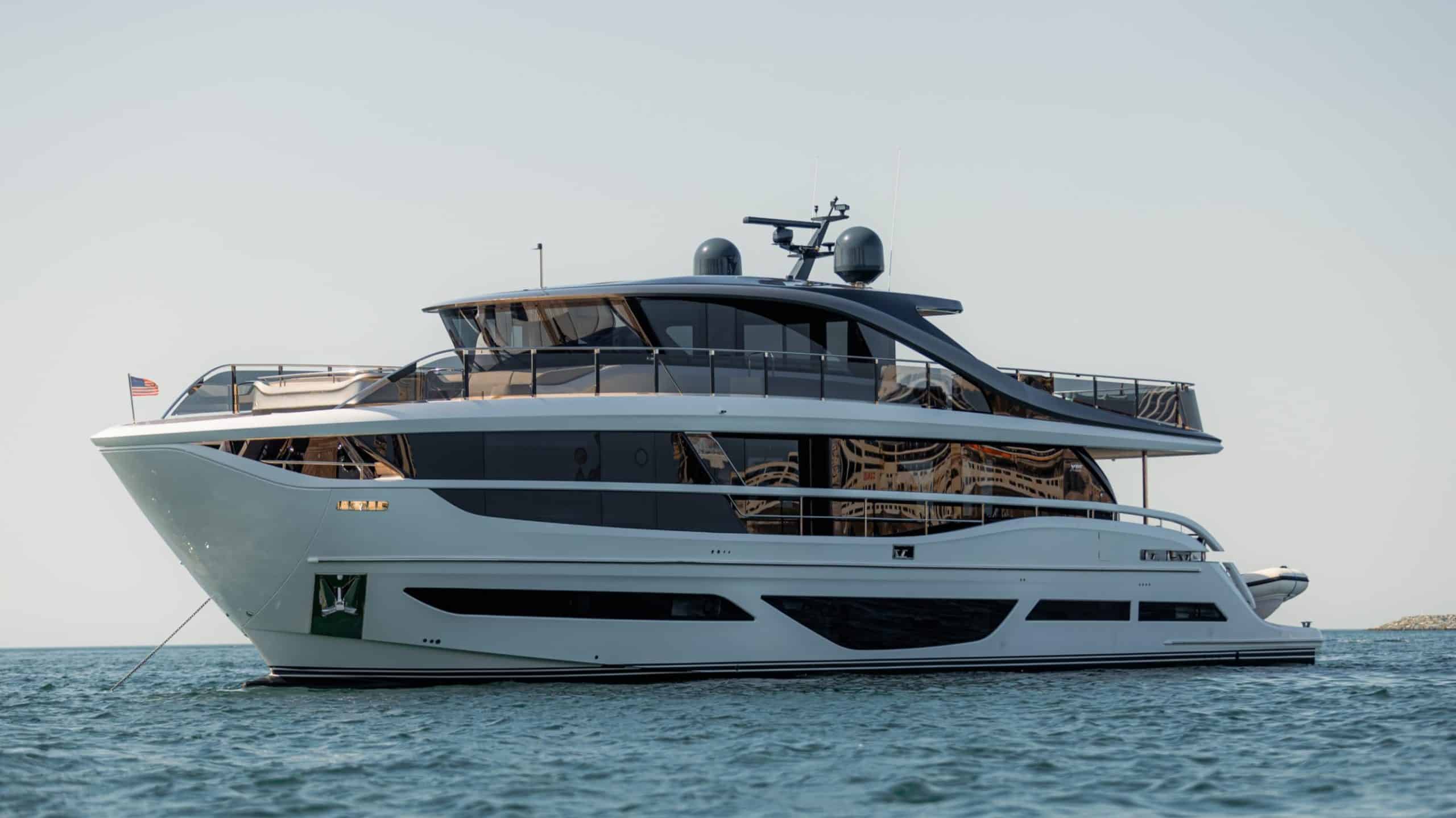 Princess X95 profile at anchor, white hull, Dubai coastline