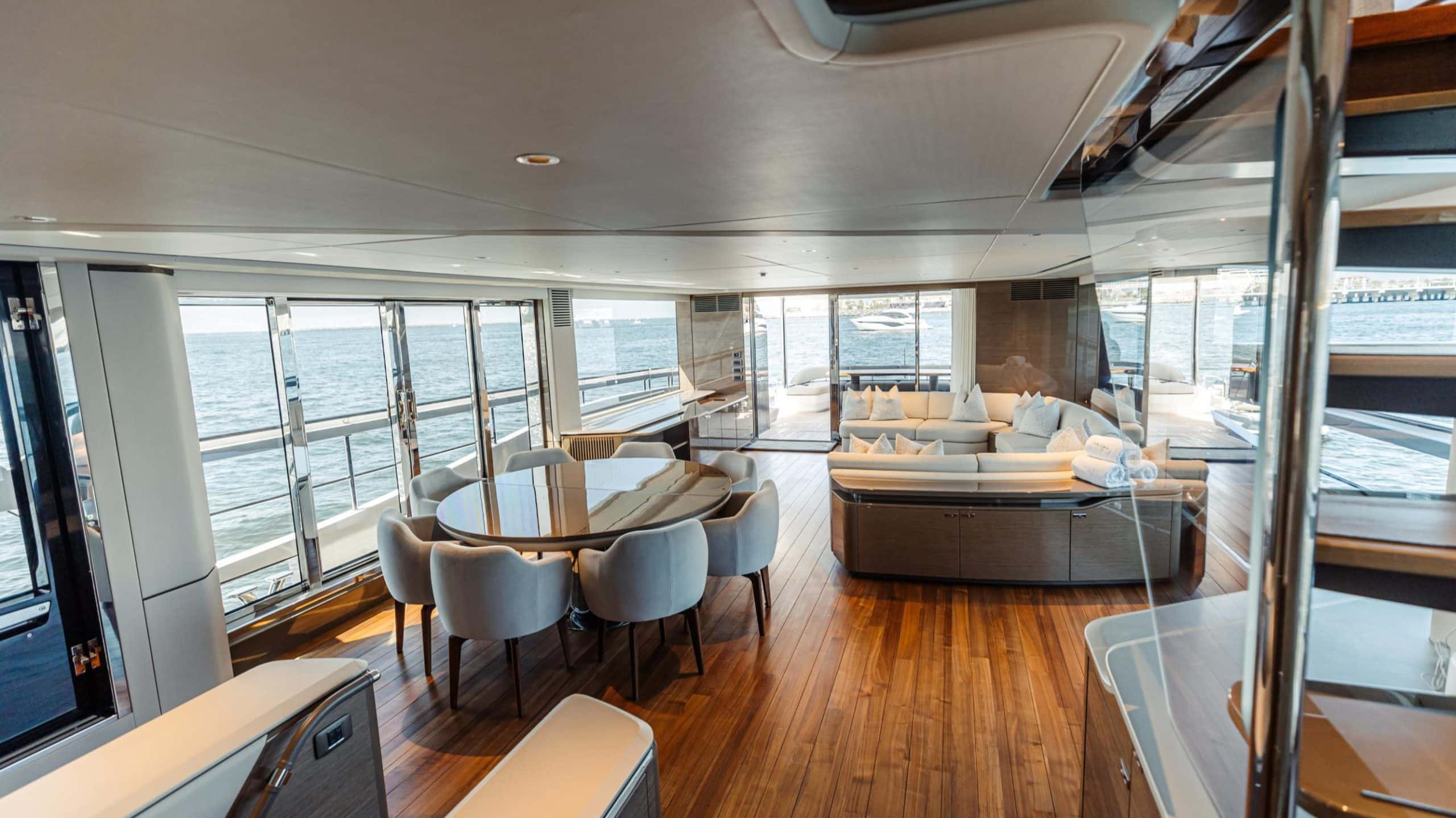 Princess X95 luxury yacht main saloon seating and dining area with open-plan design