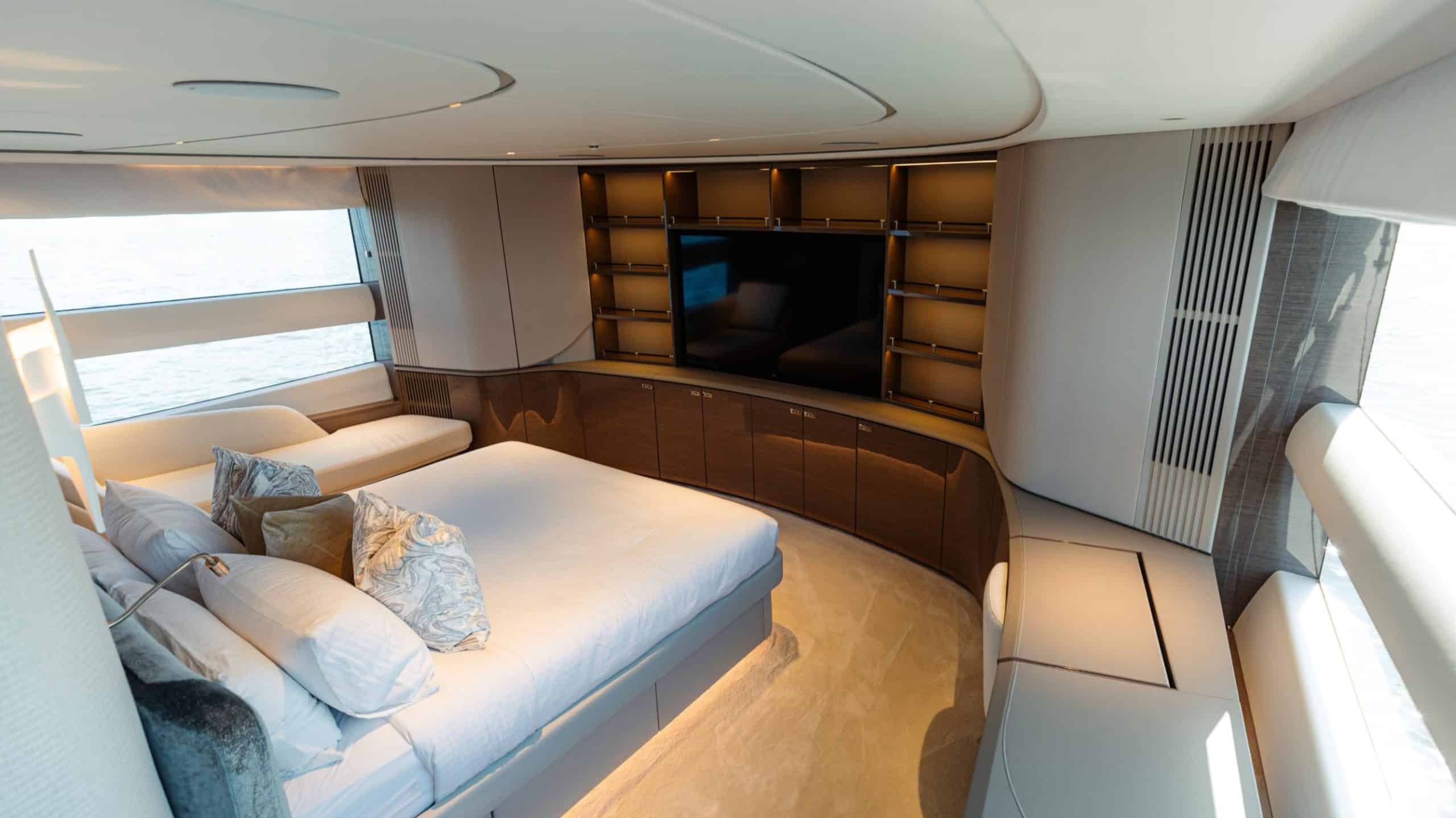 Princess X95 guest cabin with double bed and TV wall