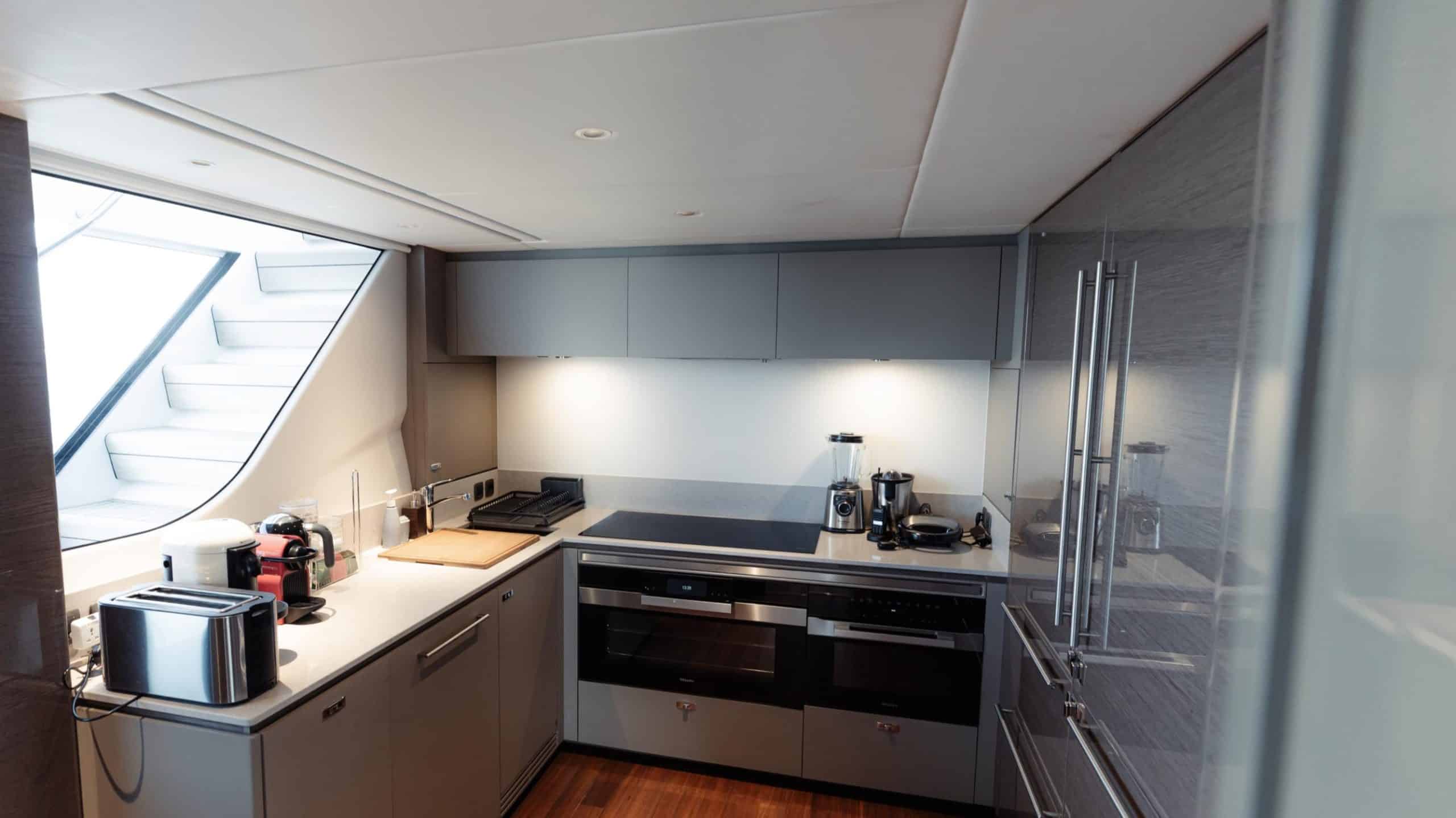 Princess X95 galley with full-size appliances
