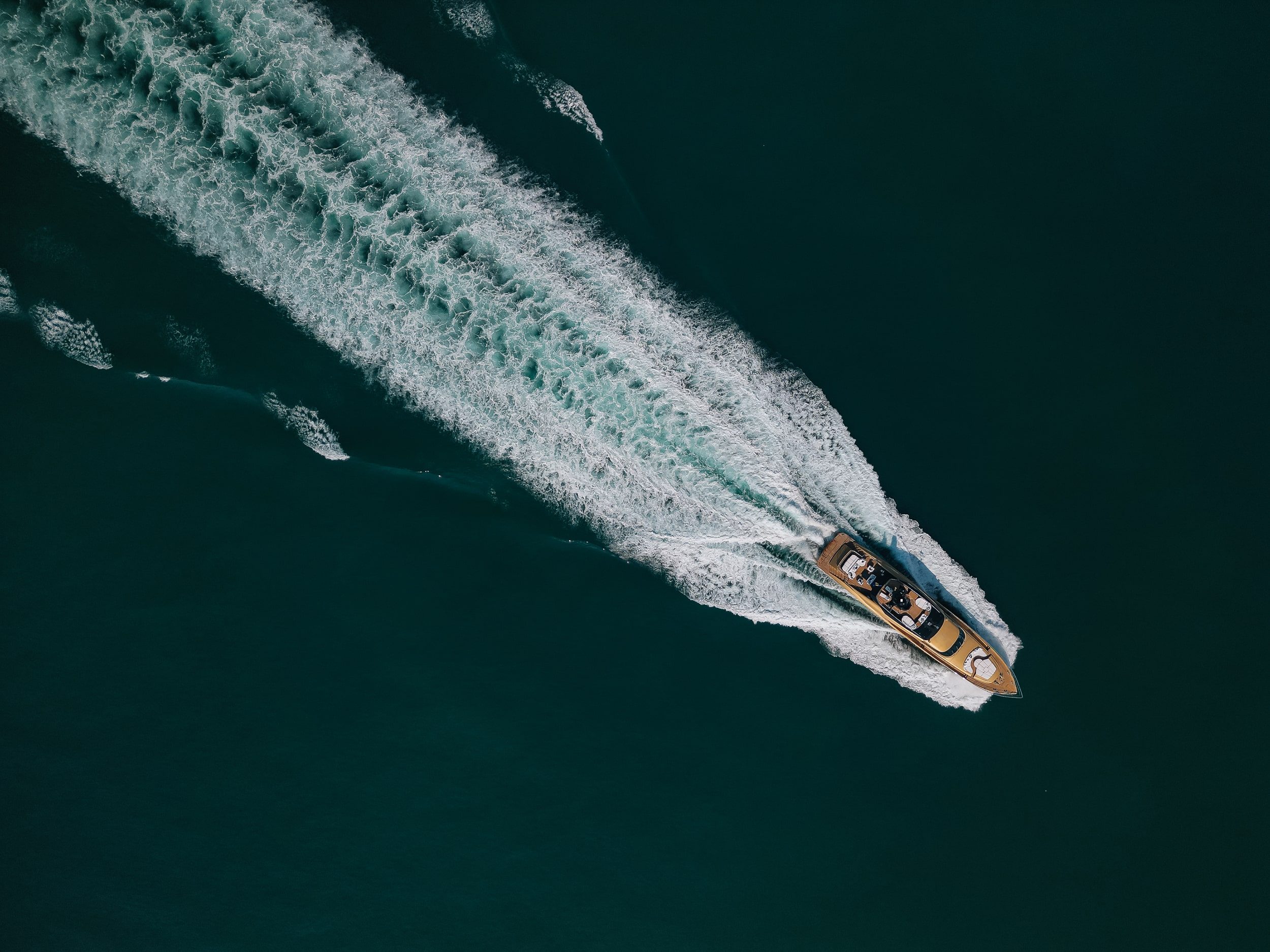 Aerial view of Royalty 136 luxury yacht cruising at sea