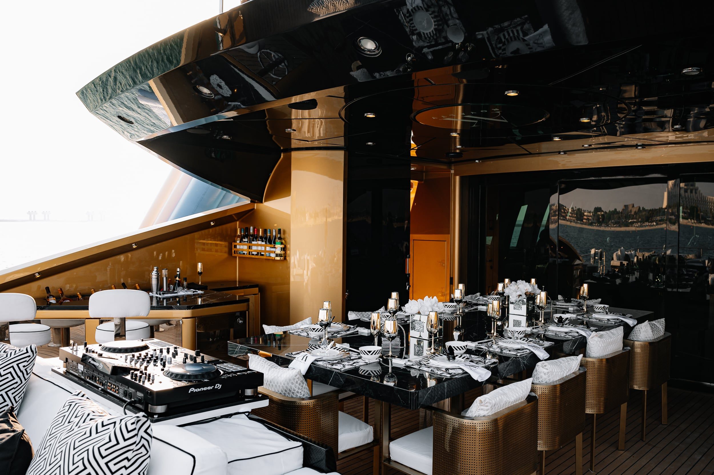 Elegant dining setup inside Royalty 136 luxury yacht