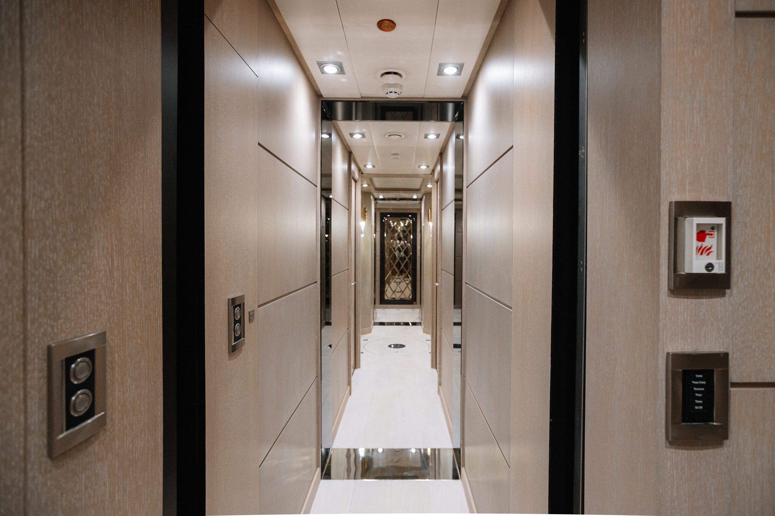 Royalty 136 luxury yacht interior hallway with modern lighting and sleek wall finishes