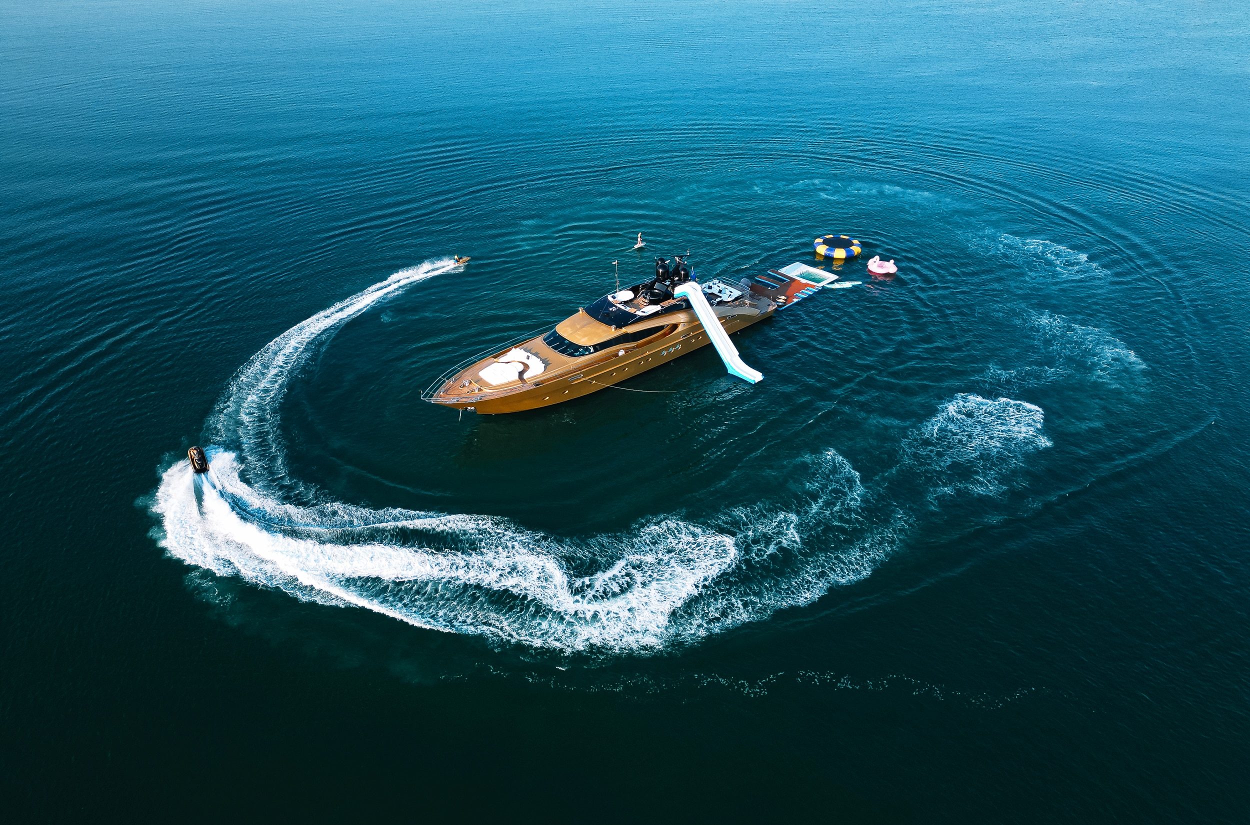 Royalty 136 luxury yacht making a turn in open ocean