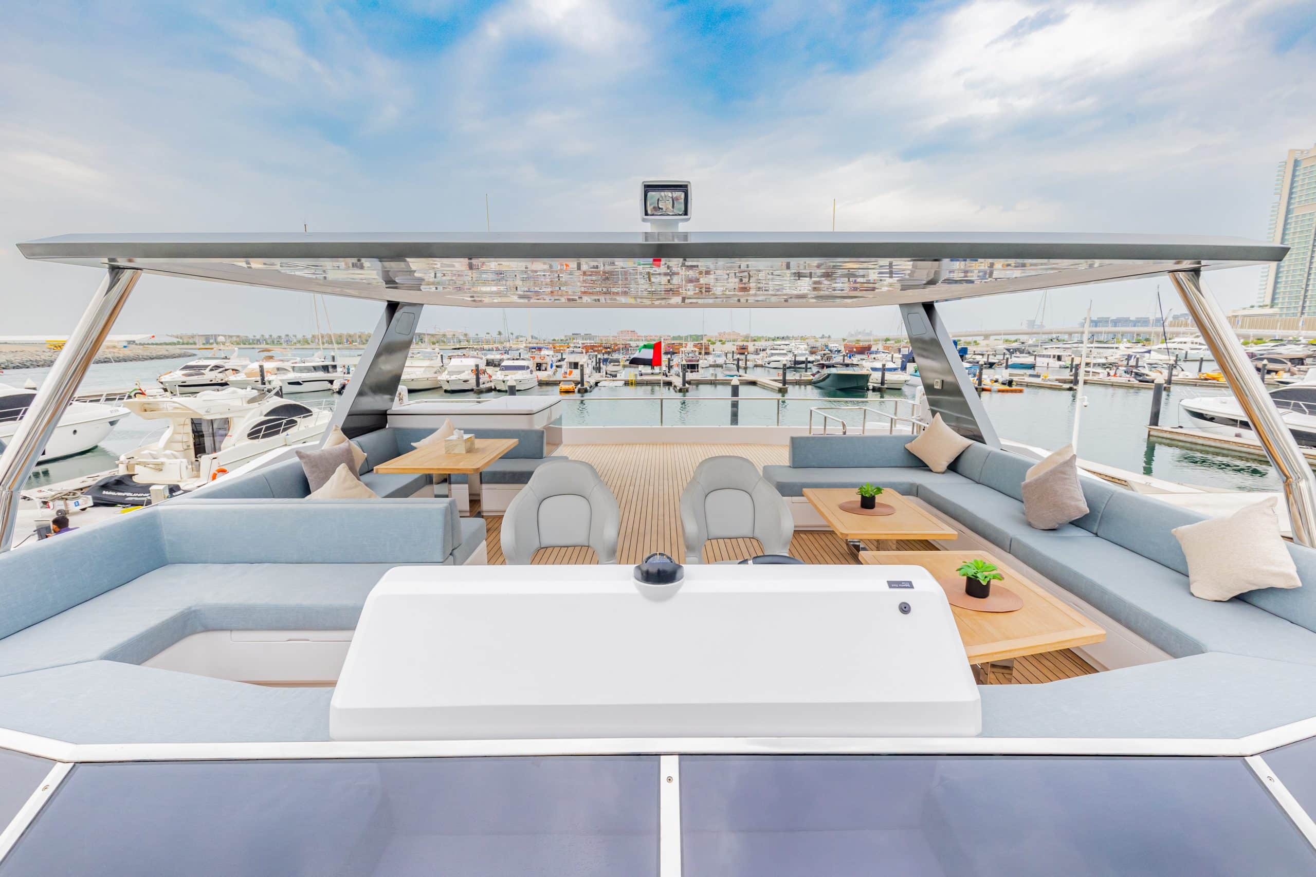 Front sunbed area of the Zirve 72 yacht with scenic water and sky views