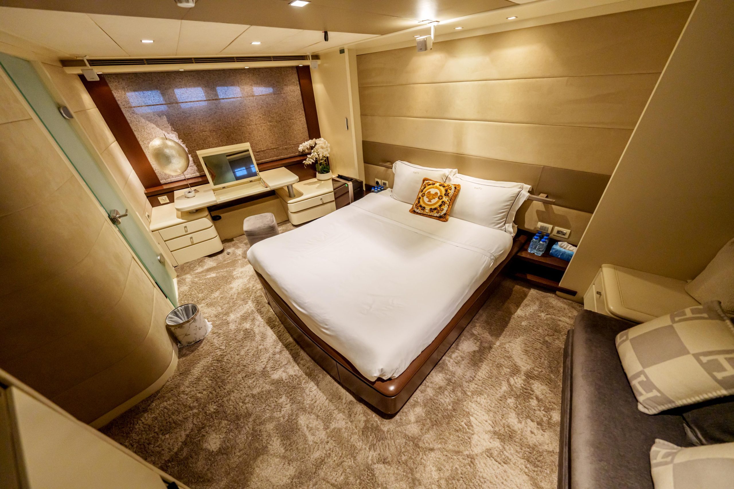 Luxury master bedroom cabin with double bed on Tatti 110 yacht