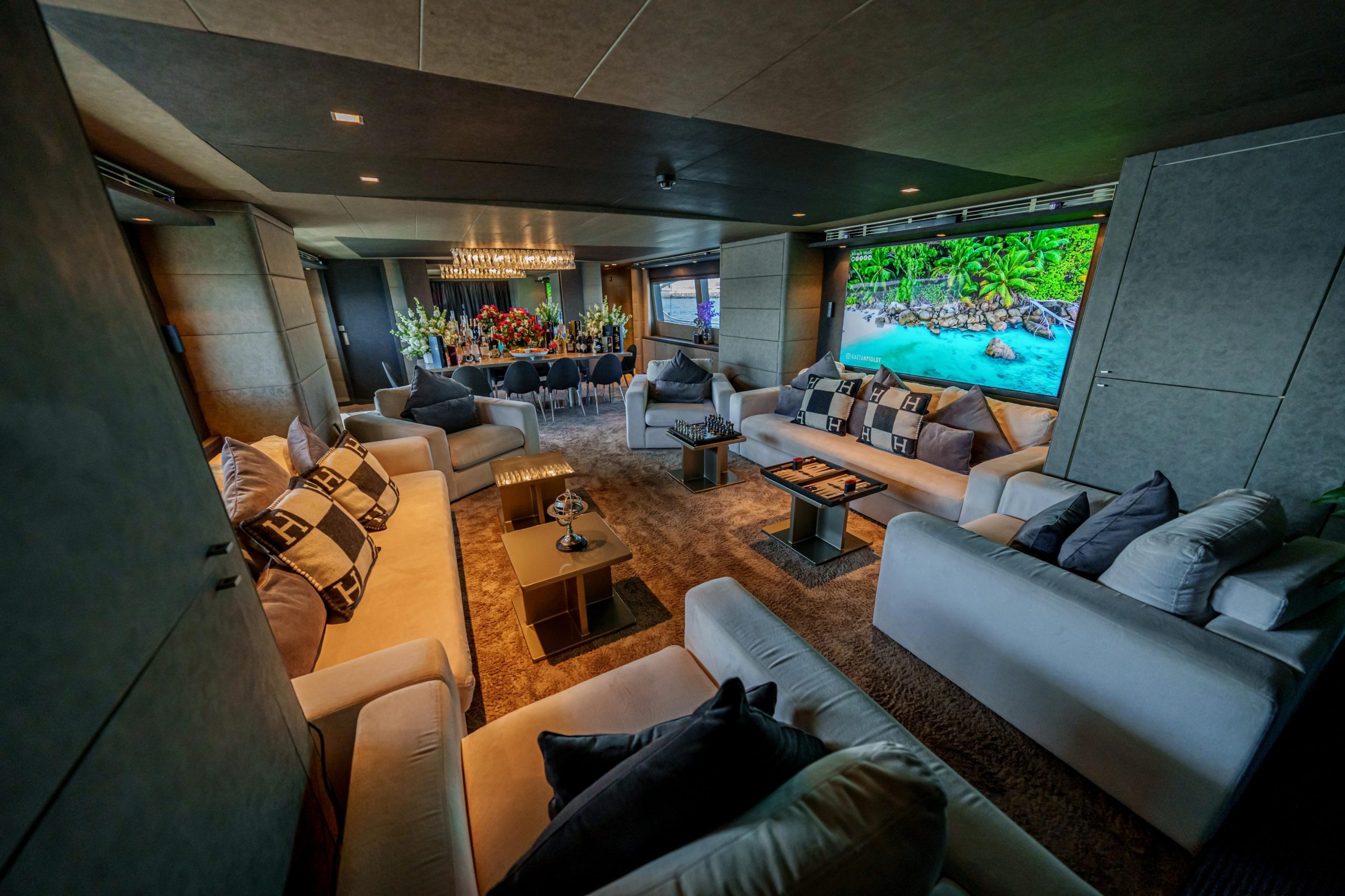 Modern entertainment lounge with TV inside Tatti 110 yacht