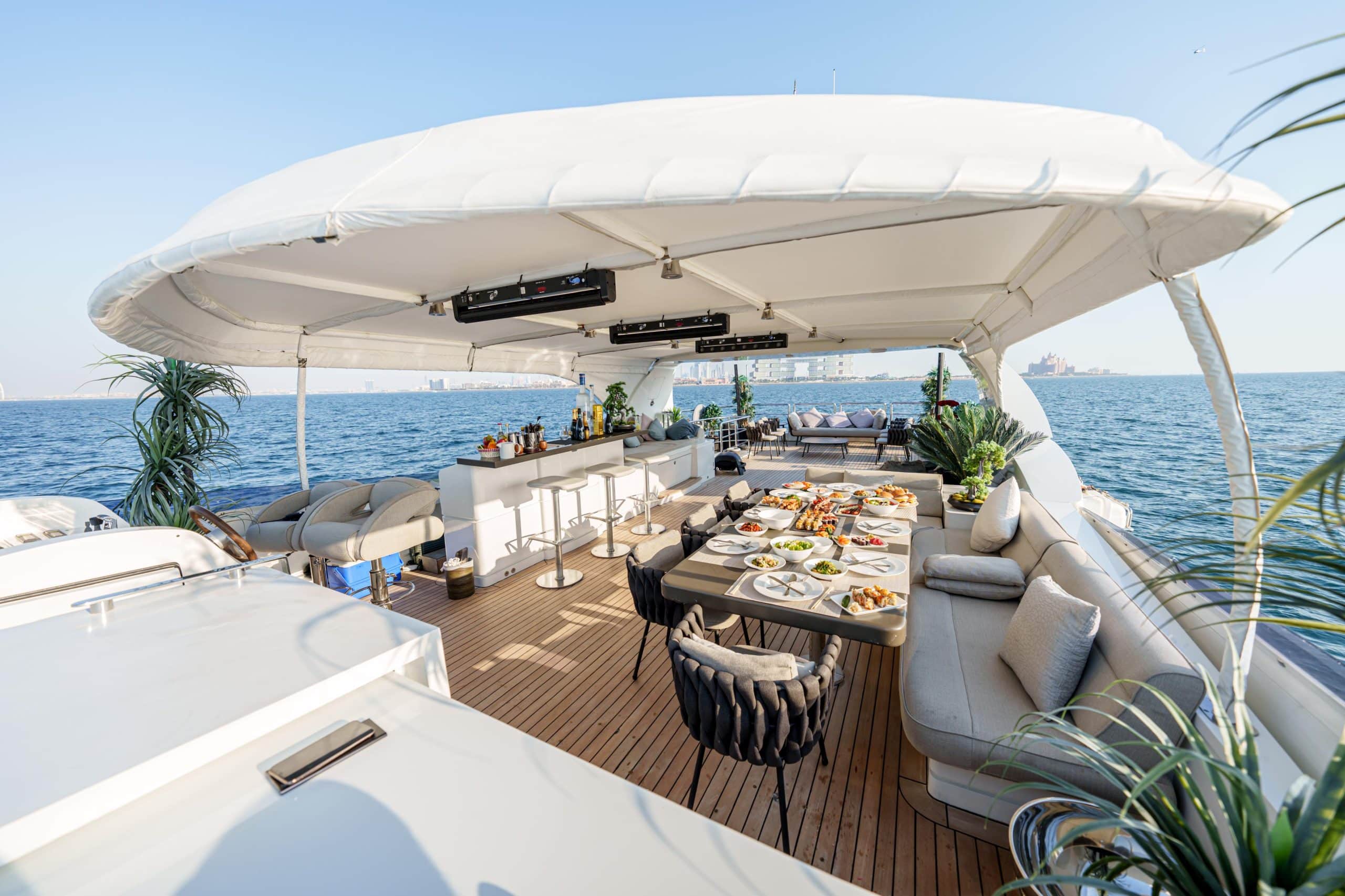 Luxury yacht dining table setup on Tatti 110 deck in Dubai