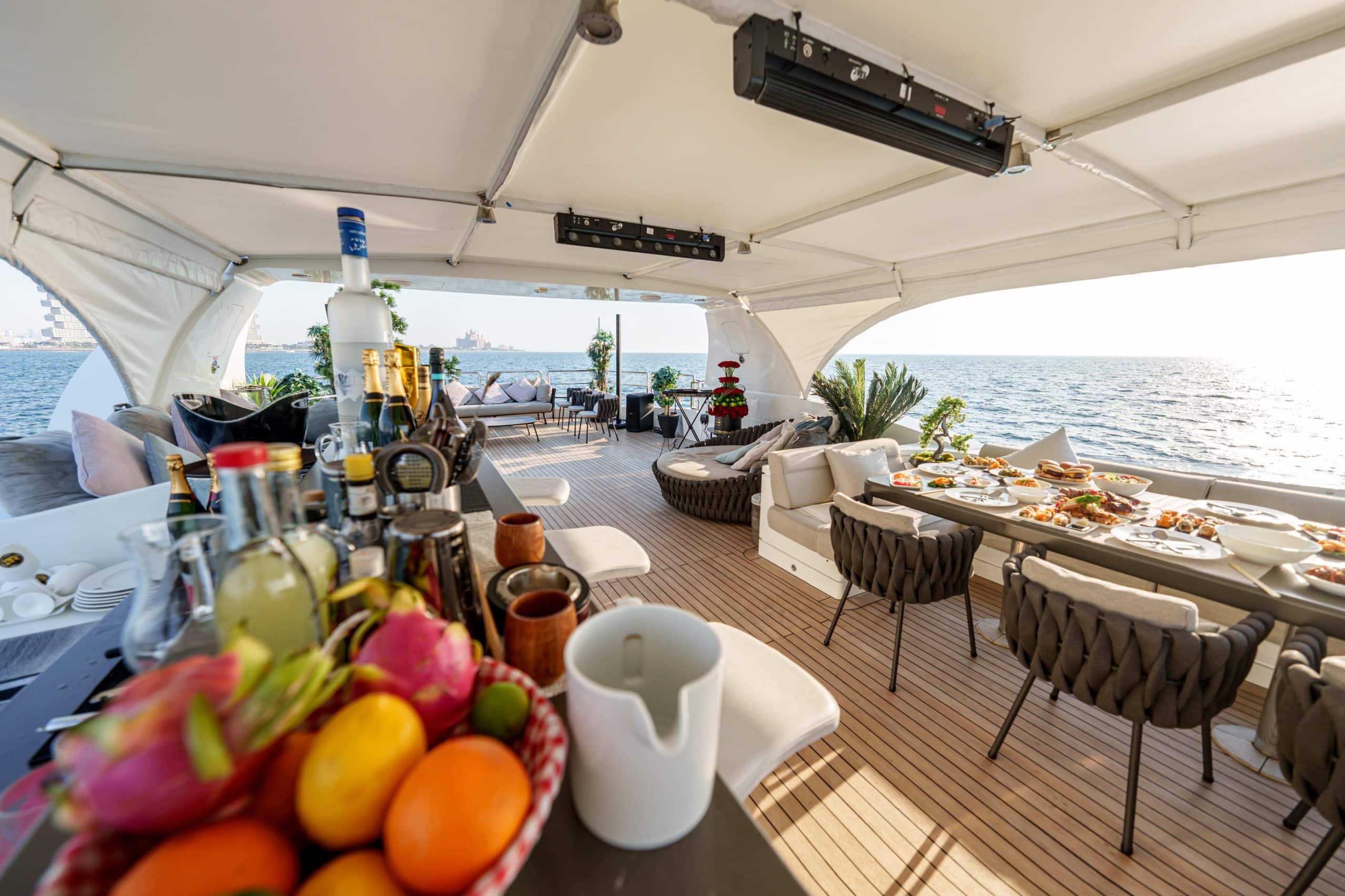 Luxury yacht deck seating with Dubai sea backdrop