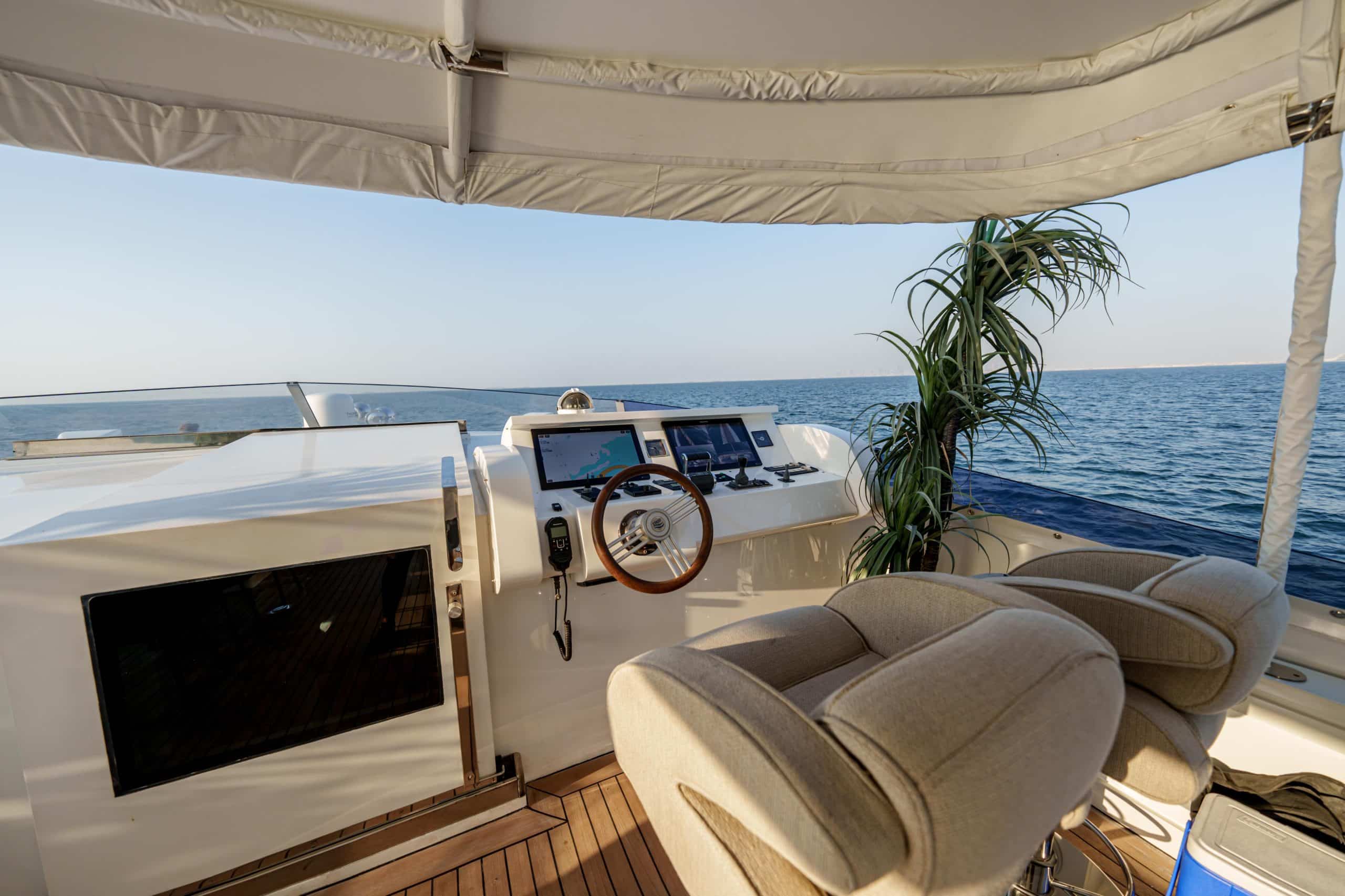 Side deck relaxation area with ocean view on Tatti 110 yacht