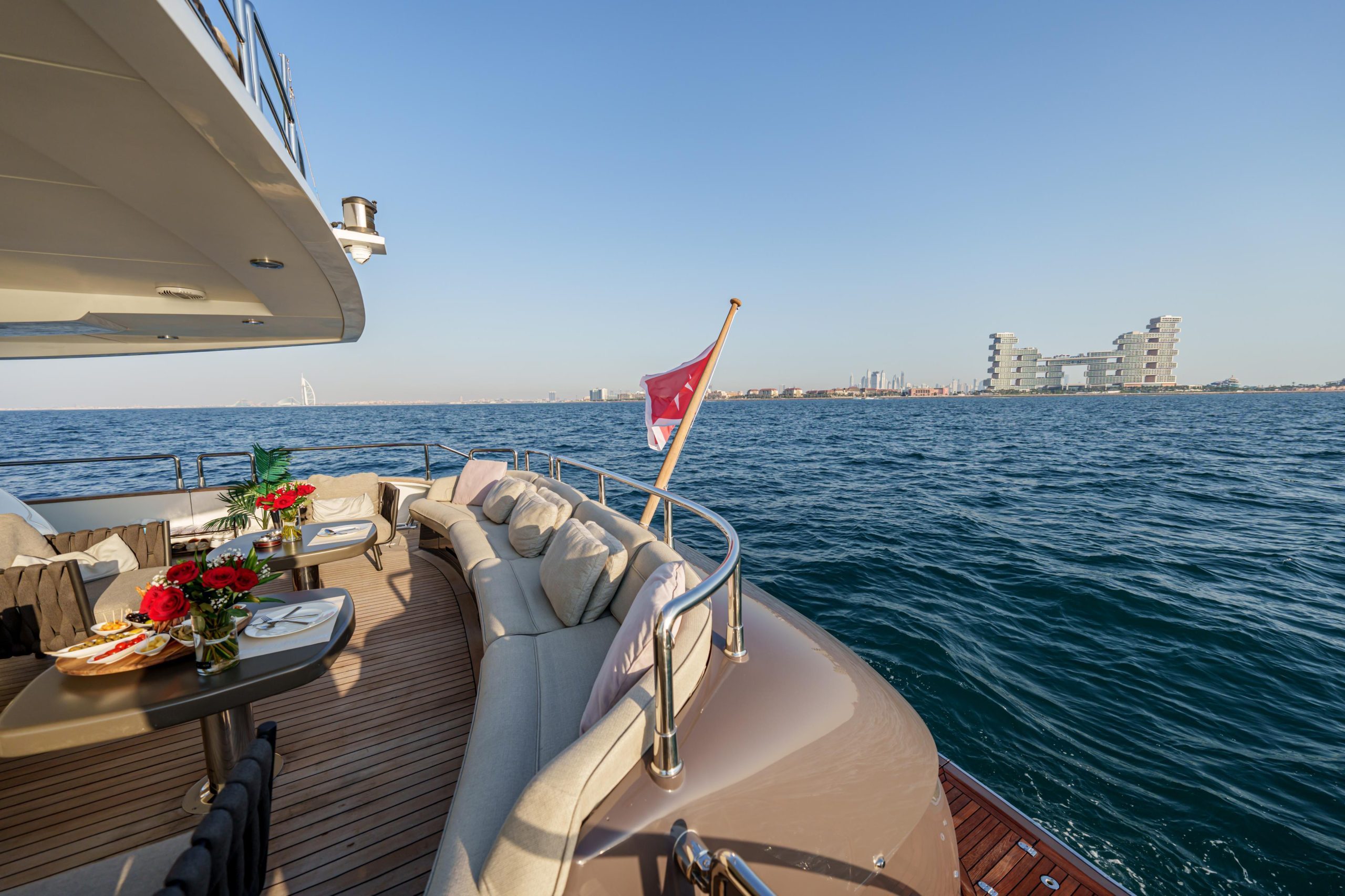 Front deck view with Dubai skyline from Tatti 110 yacht