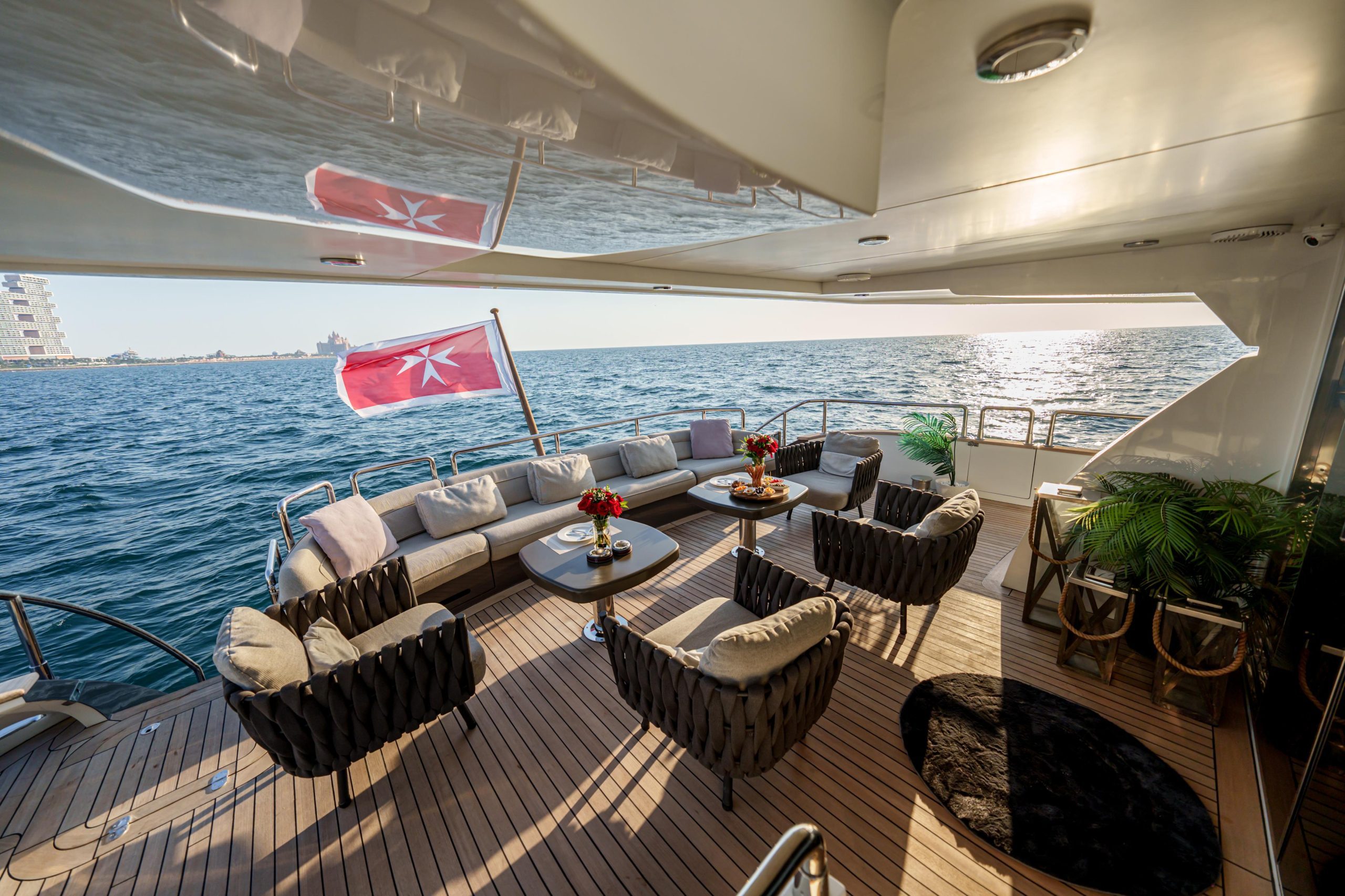 Tatti 110 yacht upper deck lounge with premium outdoor seating