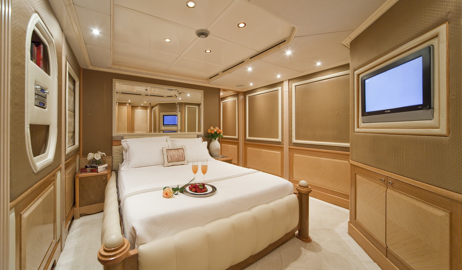 Athena 170 yacht VIP cabin with spacious layout and warm lighting