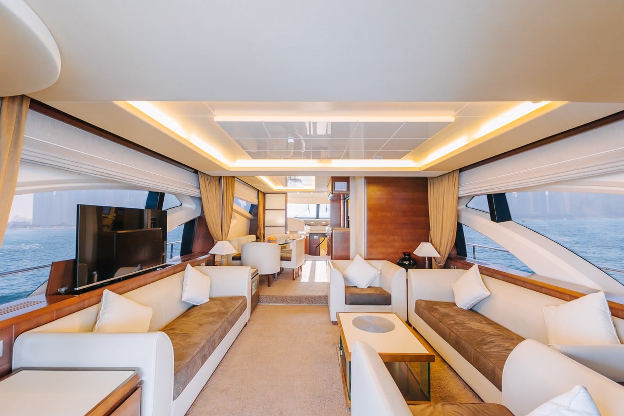 Panoramic main salon seating area inside Azimut 79 luxury yacht Abu Dhabi