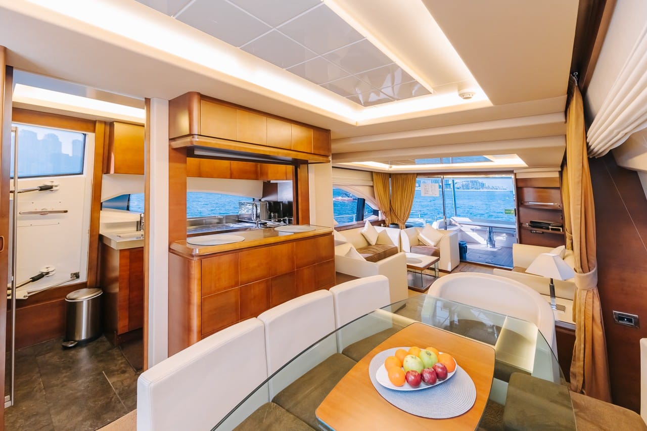 Curved luxury sofa seating inside Azimut 79 yacht interior