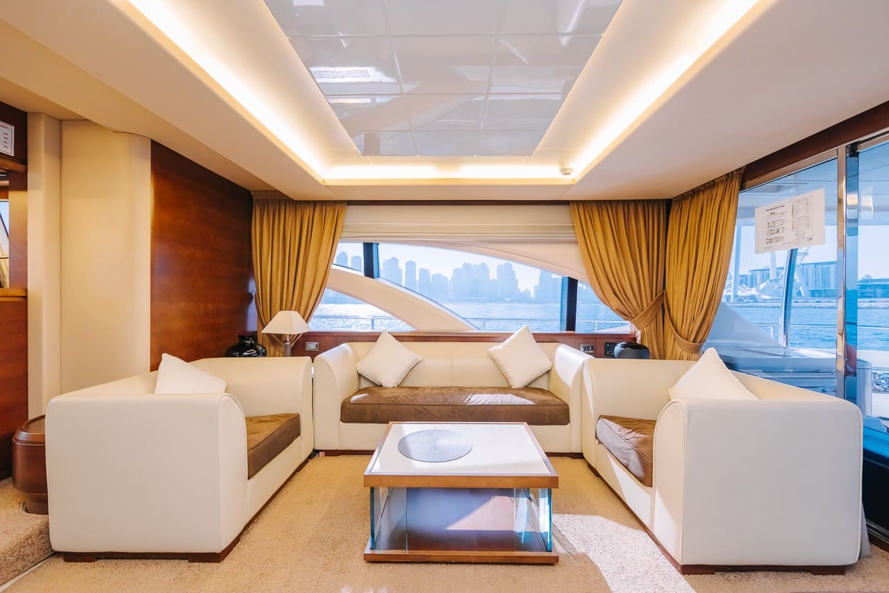 Front lounge seating area inside Azimut 79 yacht cabin