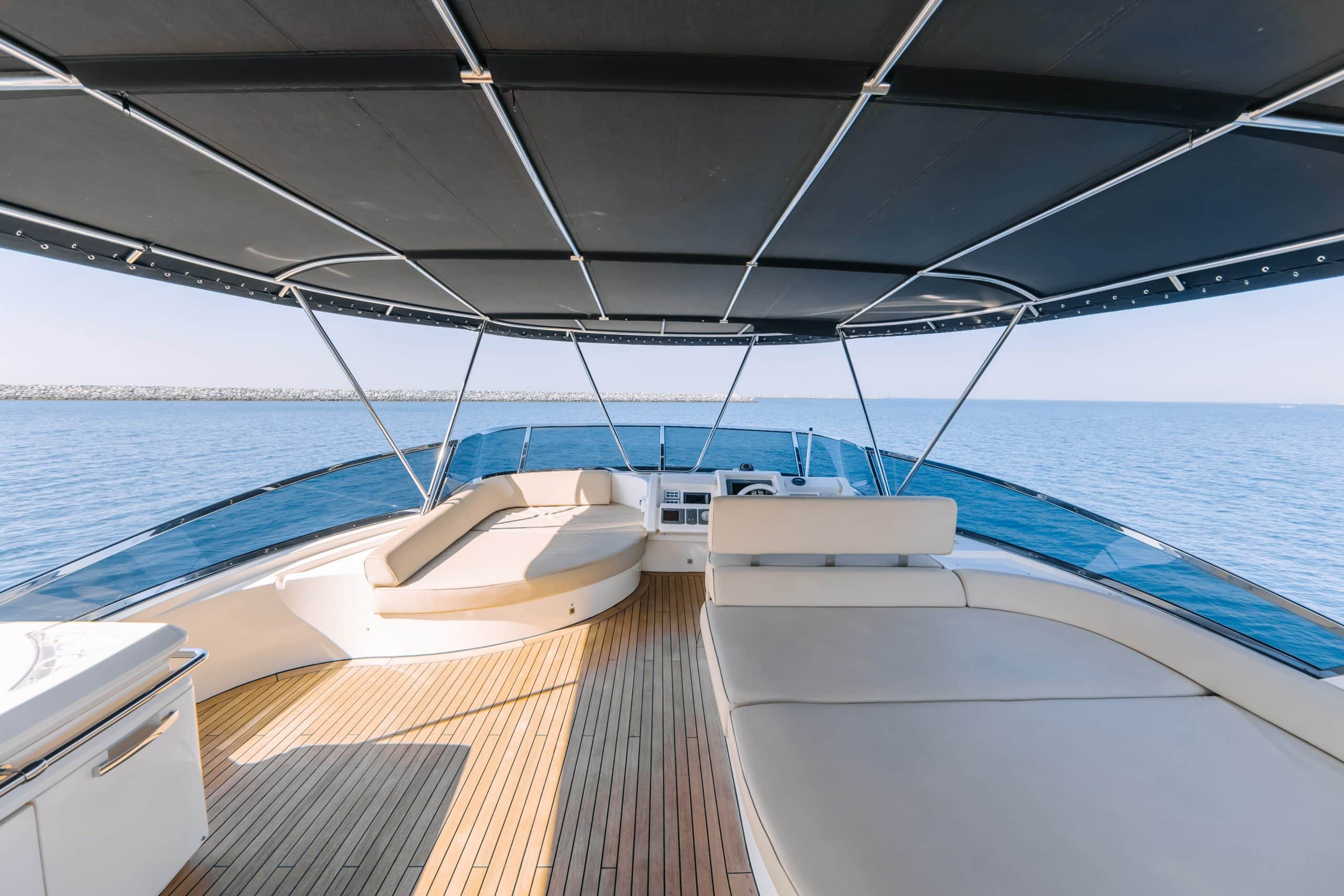 Front deck sunbeds and seating on Azimut 79 private yacht Abu Dhabi