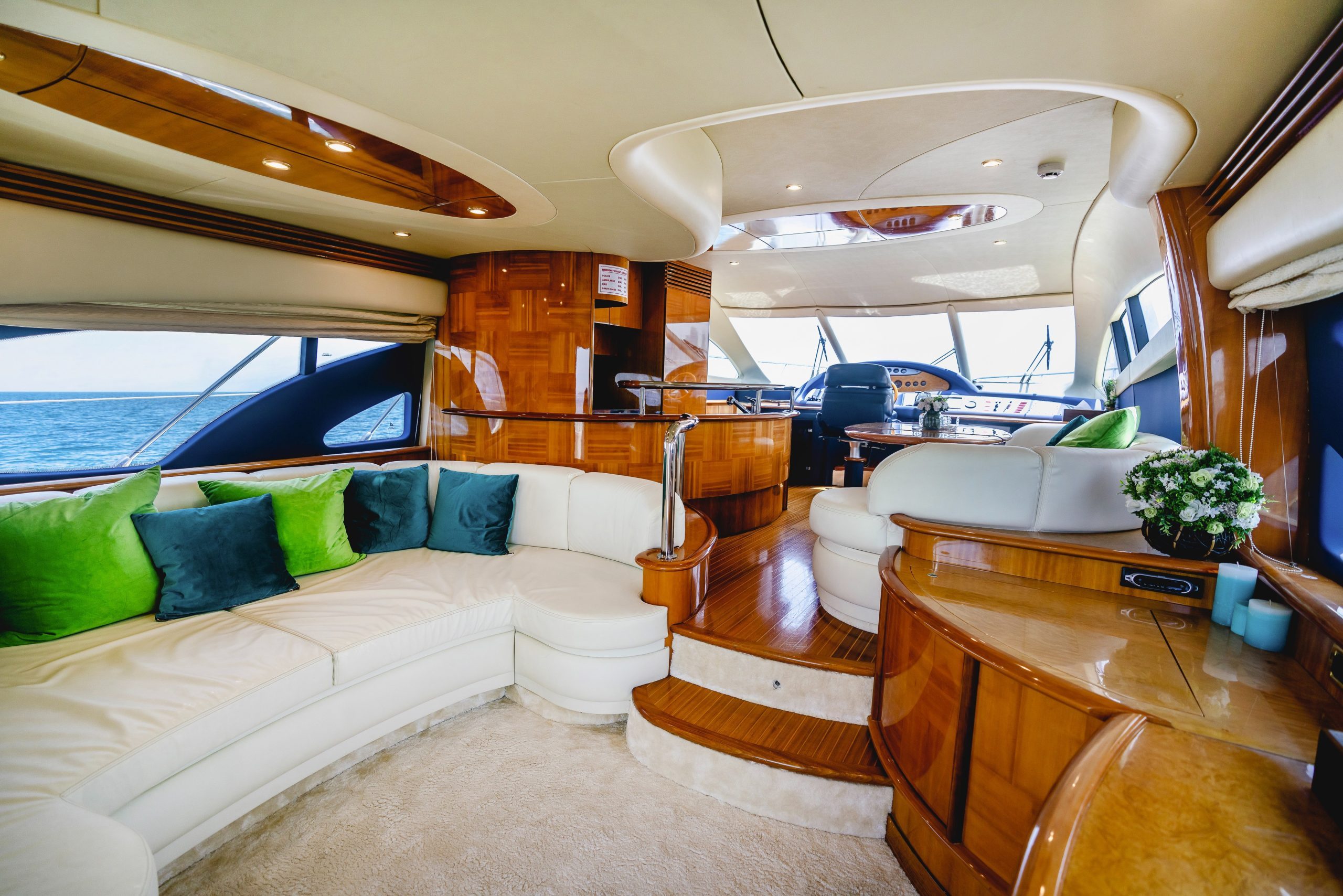 Luxury interior salon of Azimut 62 yacht with lounge and dining area