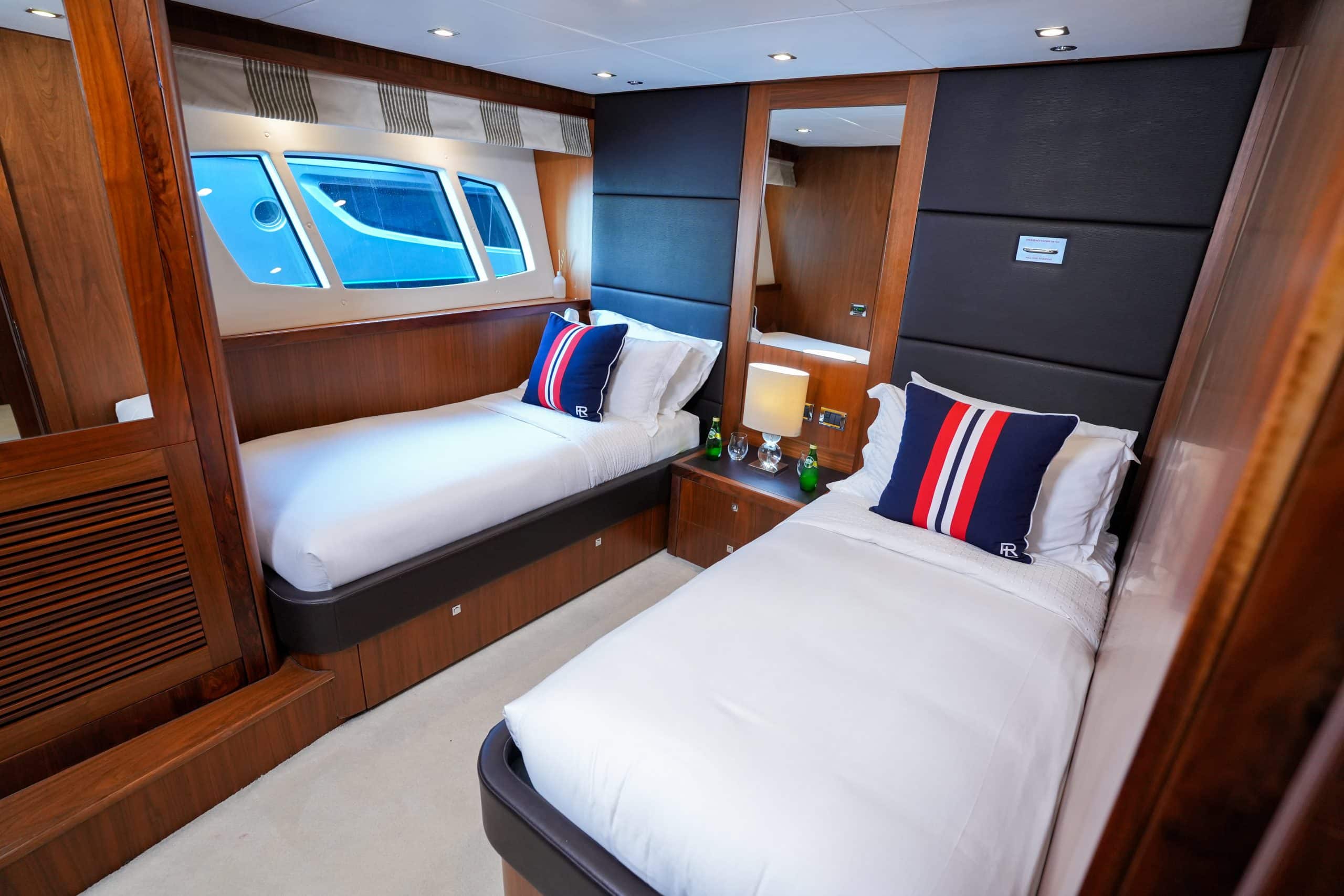 Twin bed cabin bedroom on Sunseeker 131 yacht