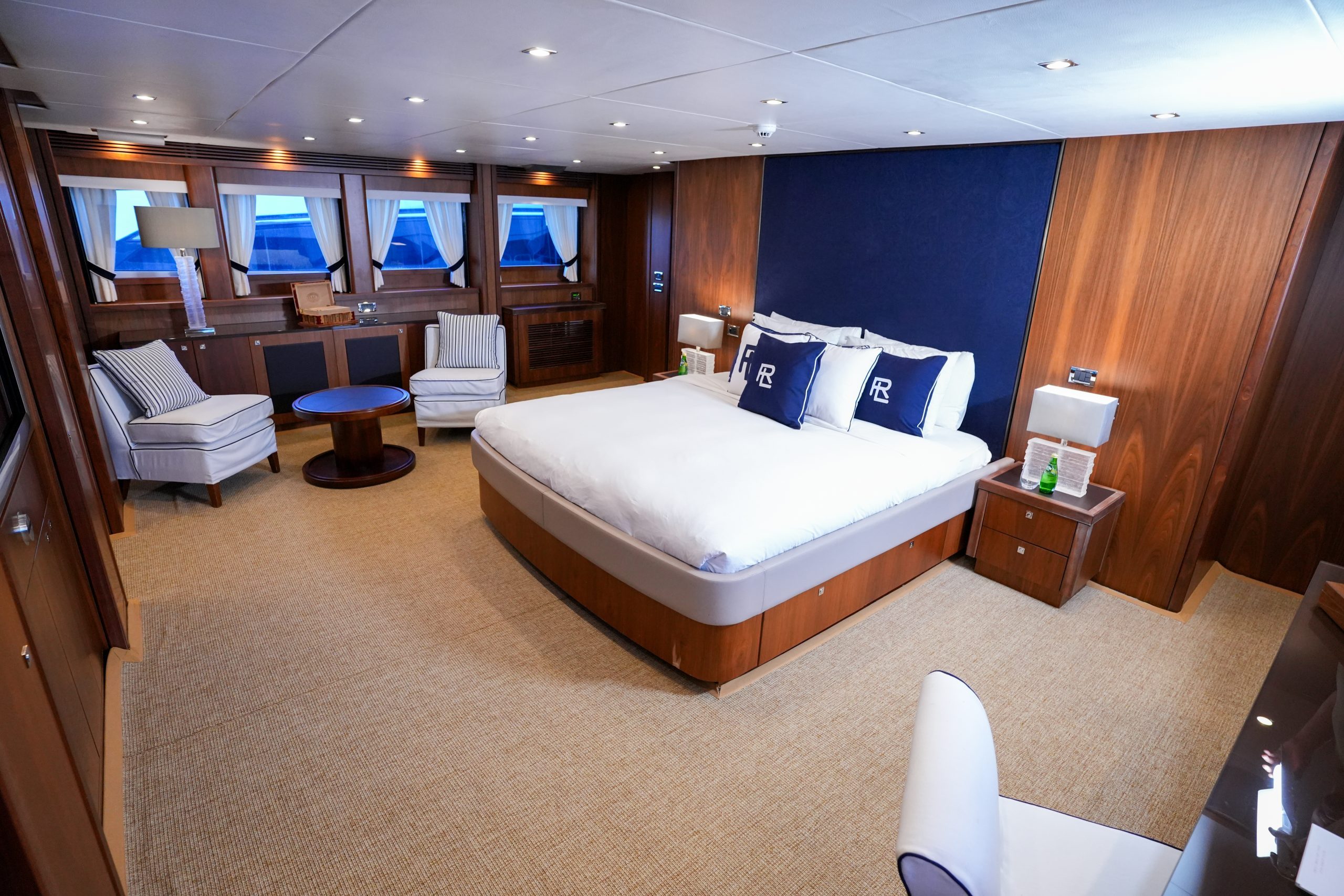 Master cabin bedroom on Sunseeker 131 yacht with king-size bed and luxury finishes