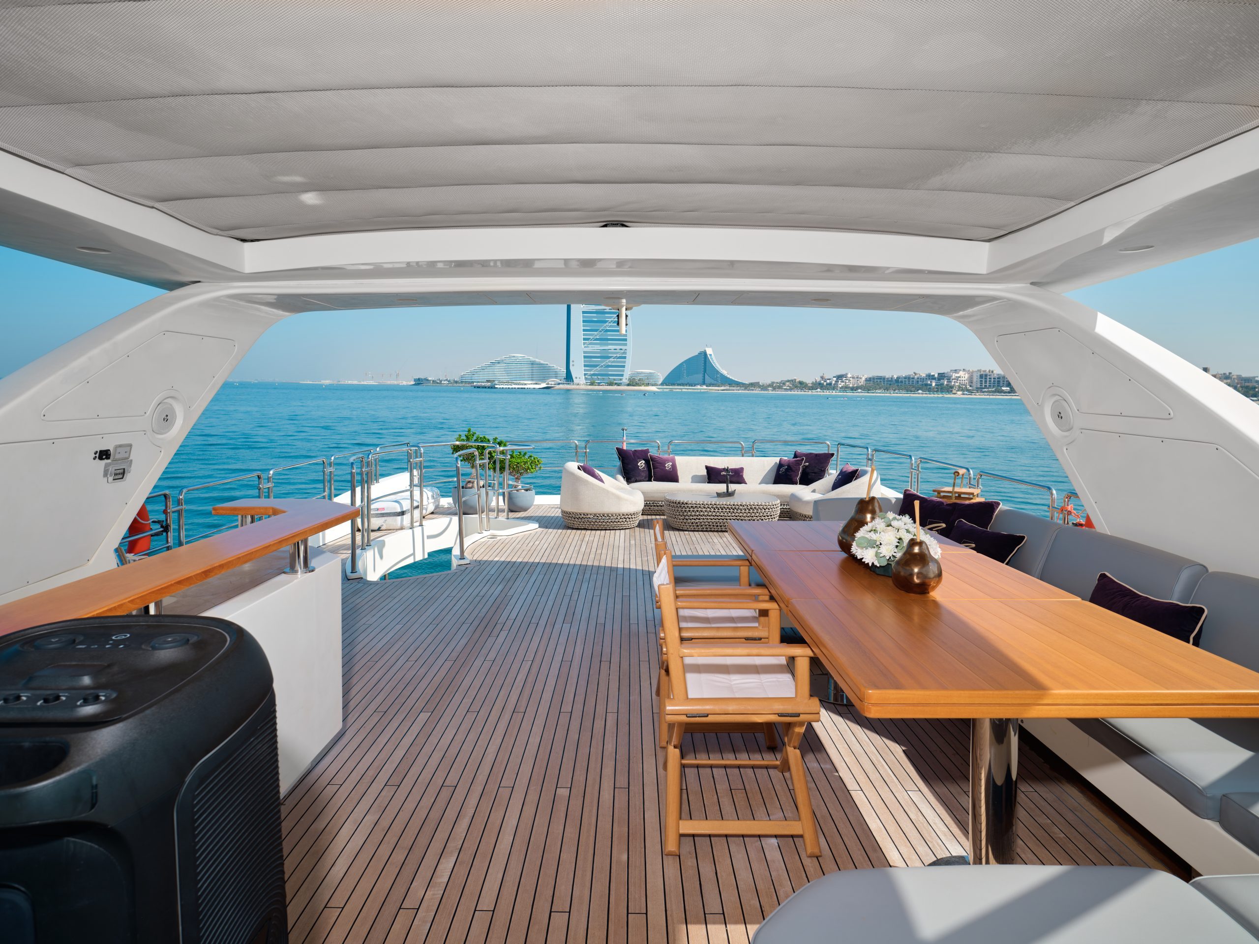 Spacious rear deck dining area on Azimut 88
