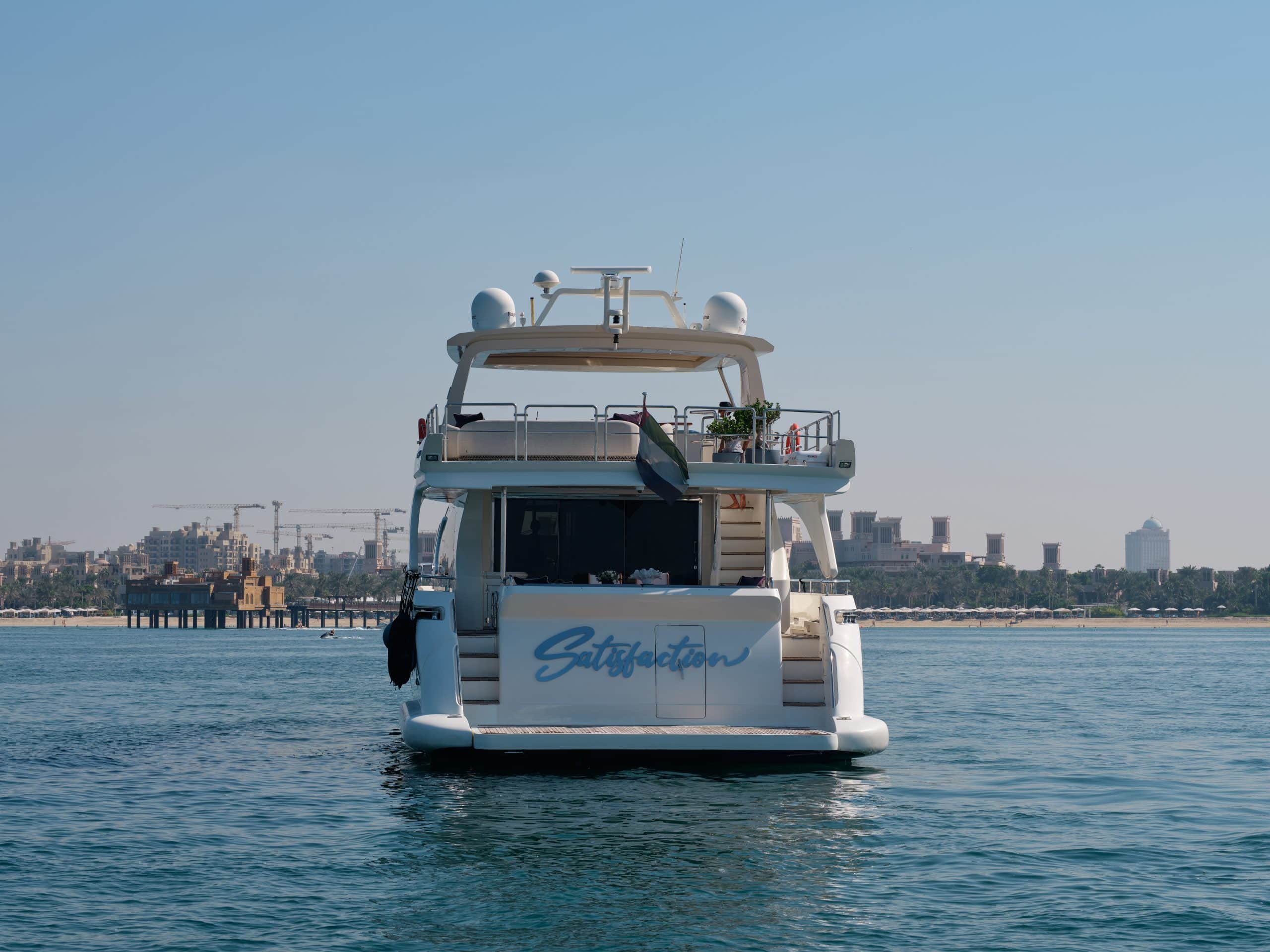Rear view of Azimut 88 yacht cruising on calm waters