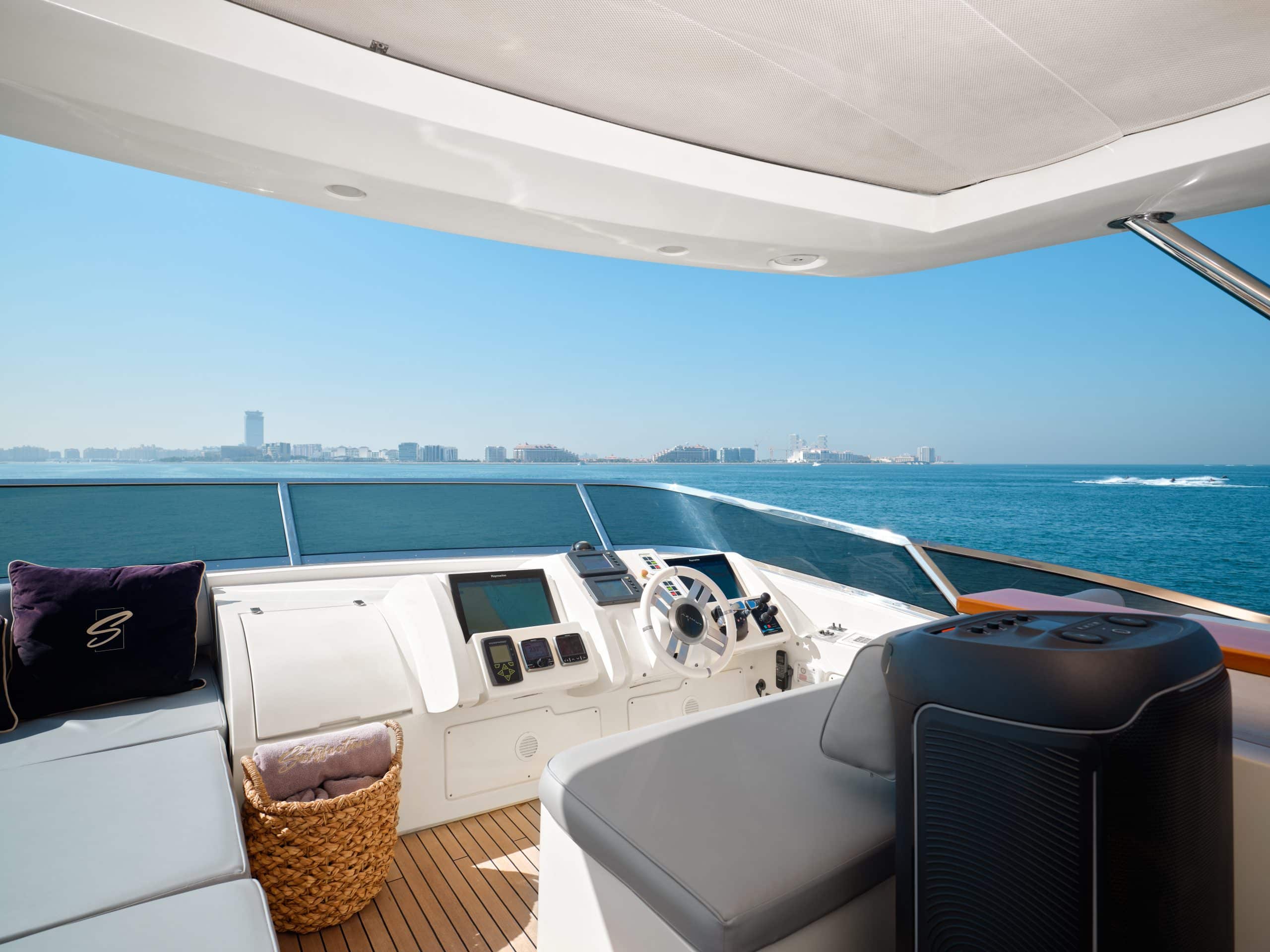 Covered outdoor lounge area on Azimut 88 yacht