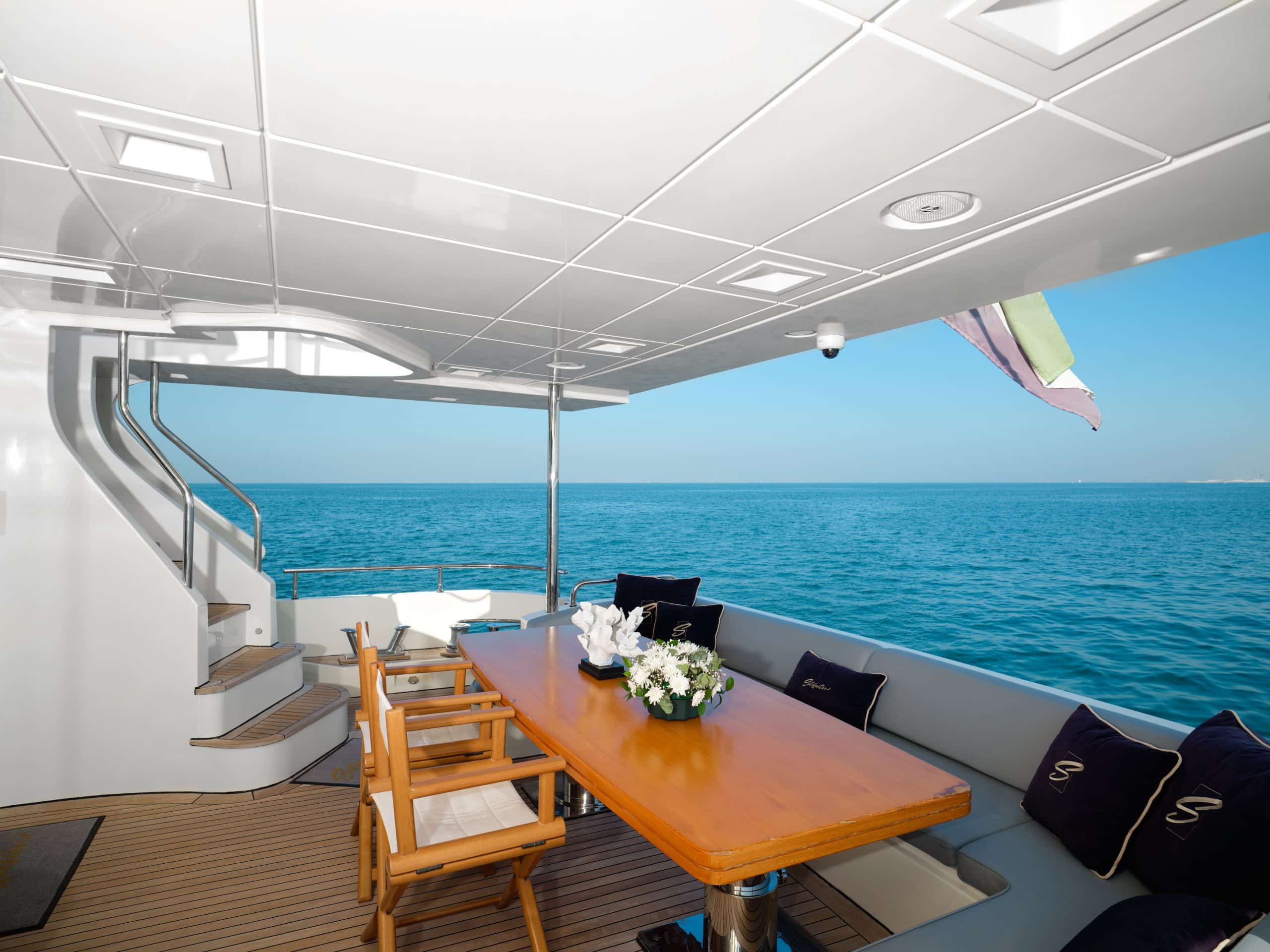Shaded dining and seating area aboard Azimut 88