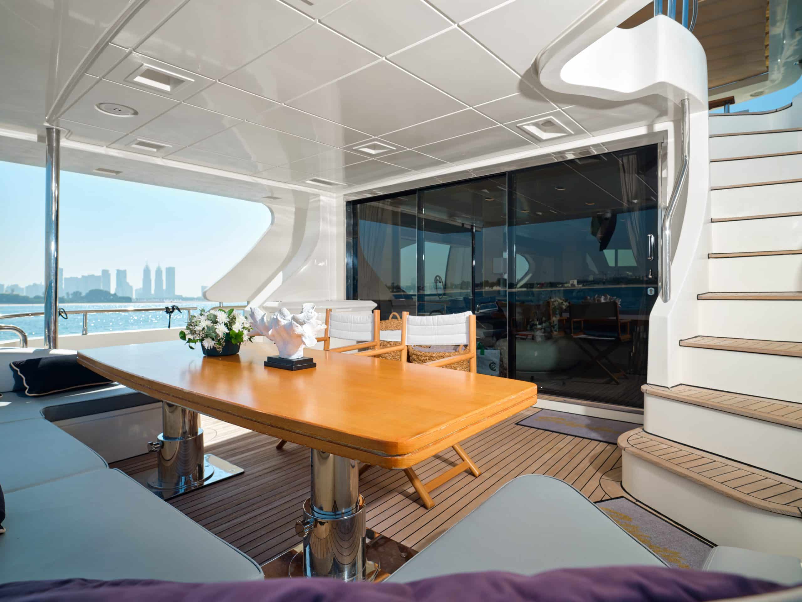 Modern dining and lounge area inside Azimut 88 yacht