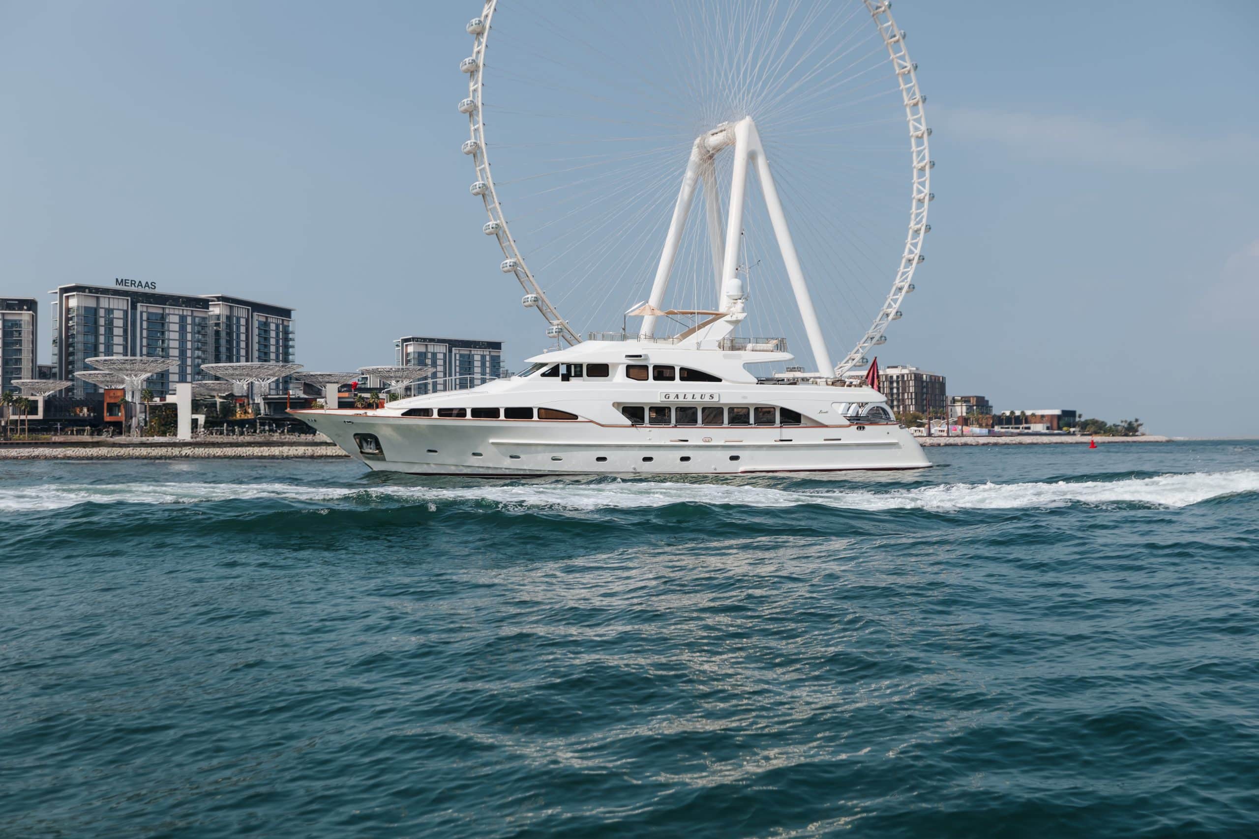 Luxury yacht cruising near Ain Dubai on the waters of Dubai.