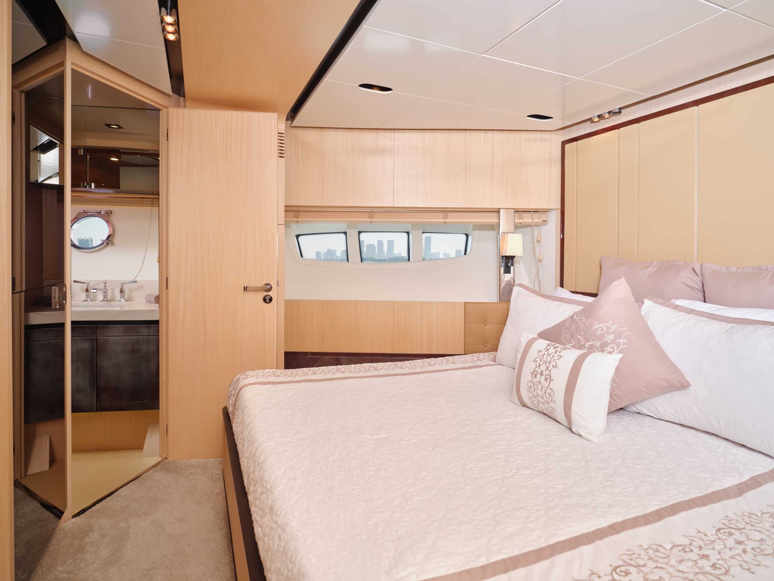 Twin guest cabin bedroom inside Azimut 88 yacht