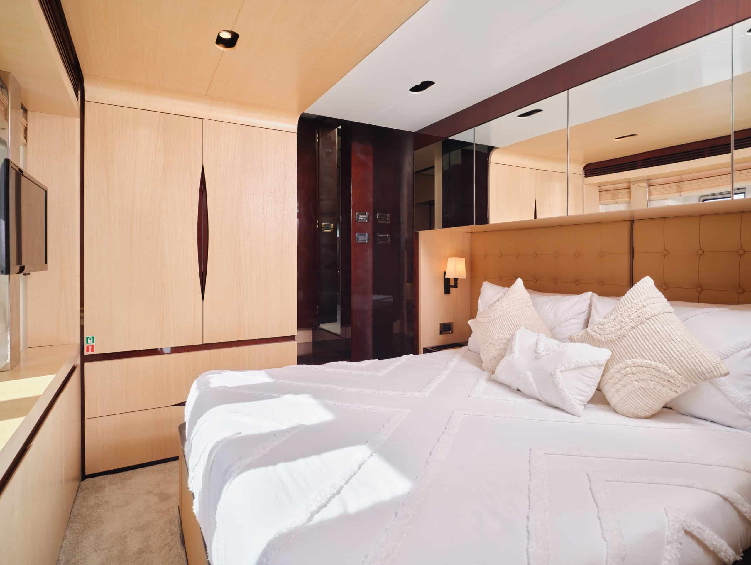 Stylish bedroom cabin interior on Azimut 88 yacht