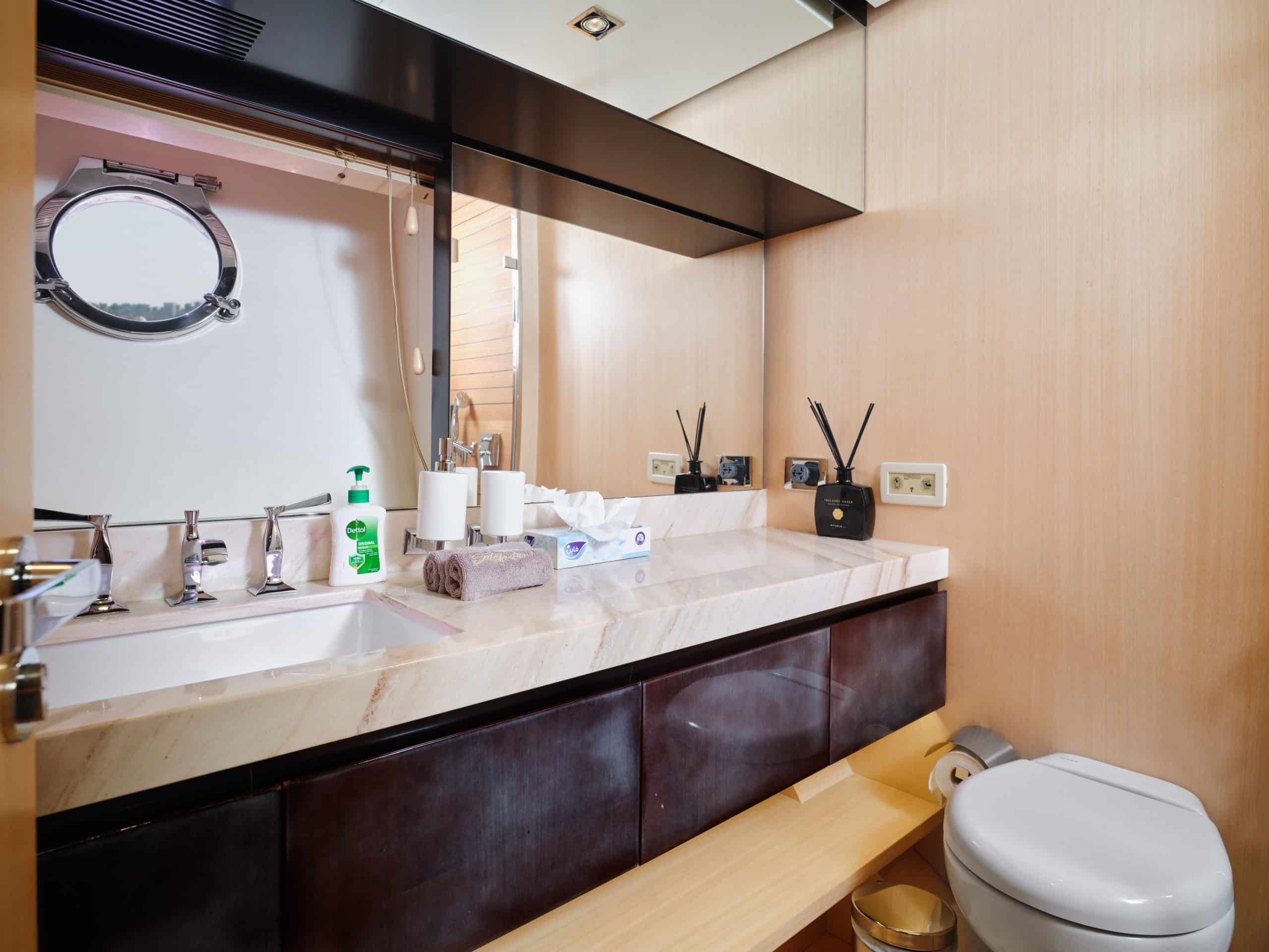 Modern yacht bathroom with sink on Azimut 88