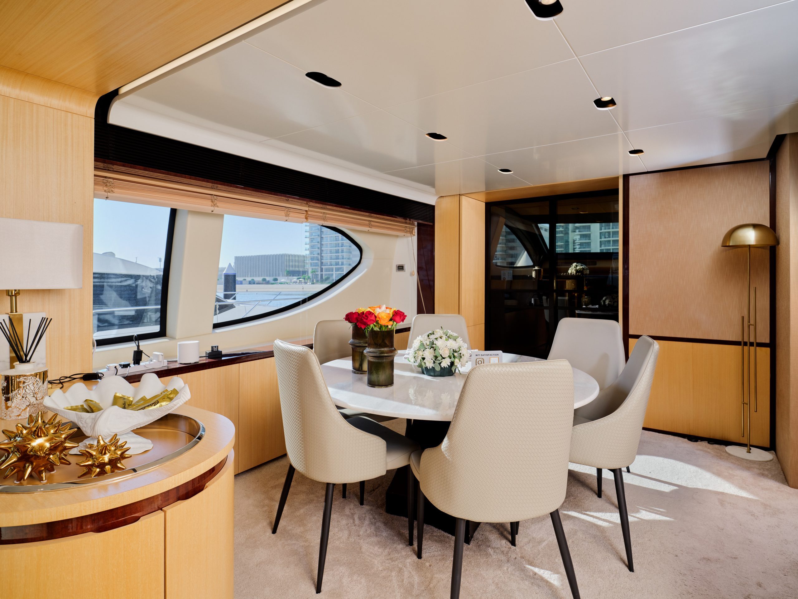 Interior dining table setup on Azimut 88 yacht