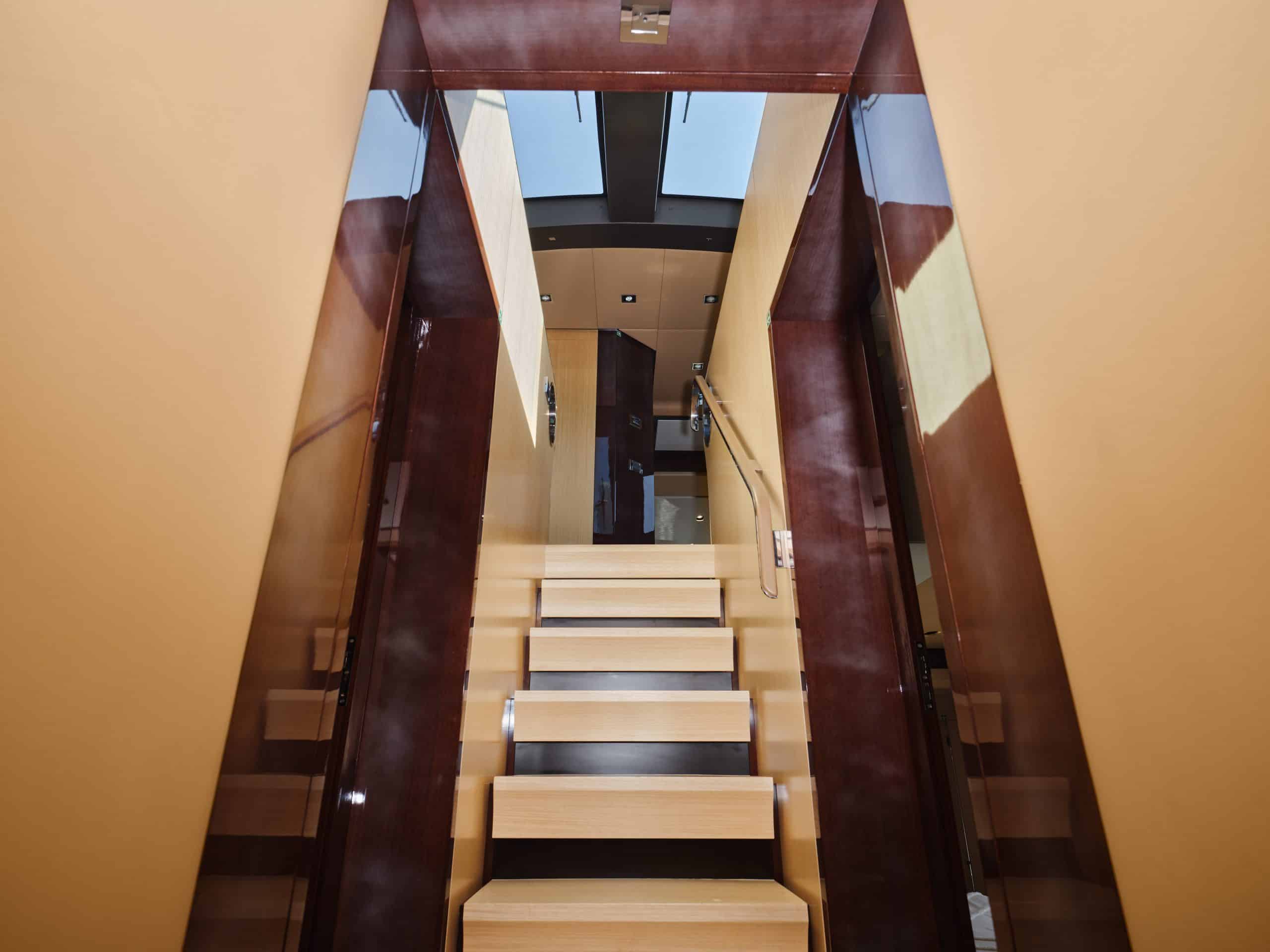 Interior staircase with wooden finishes on Azimut 88