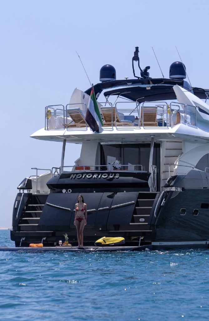 aft deck of sunseeker notorious with model and seabob