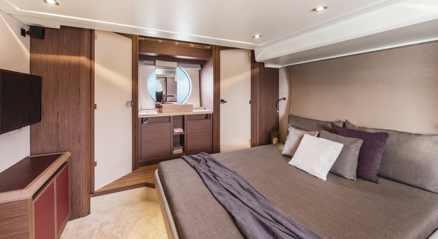Monaco 60 yacht twin bedroom cabin with wooden paneling and modern decor