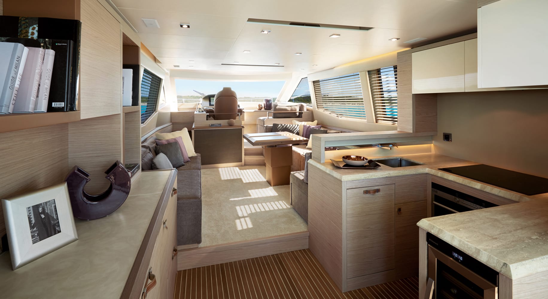 Monaco 60 yacht side deck walkway with wooden flooring and sea view