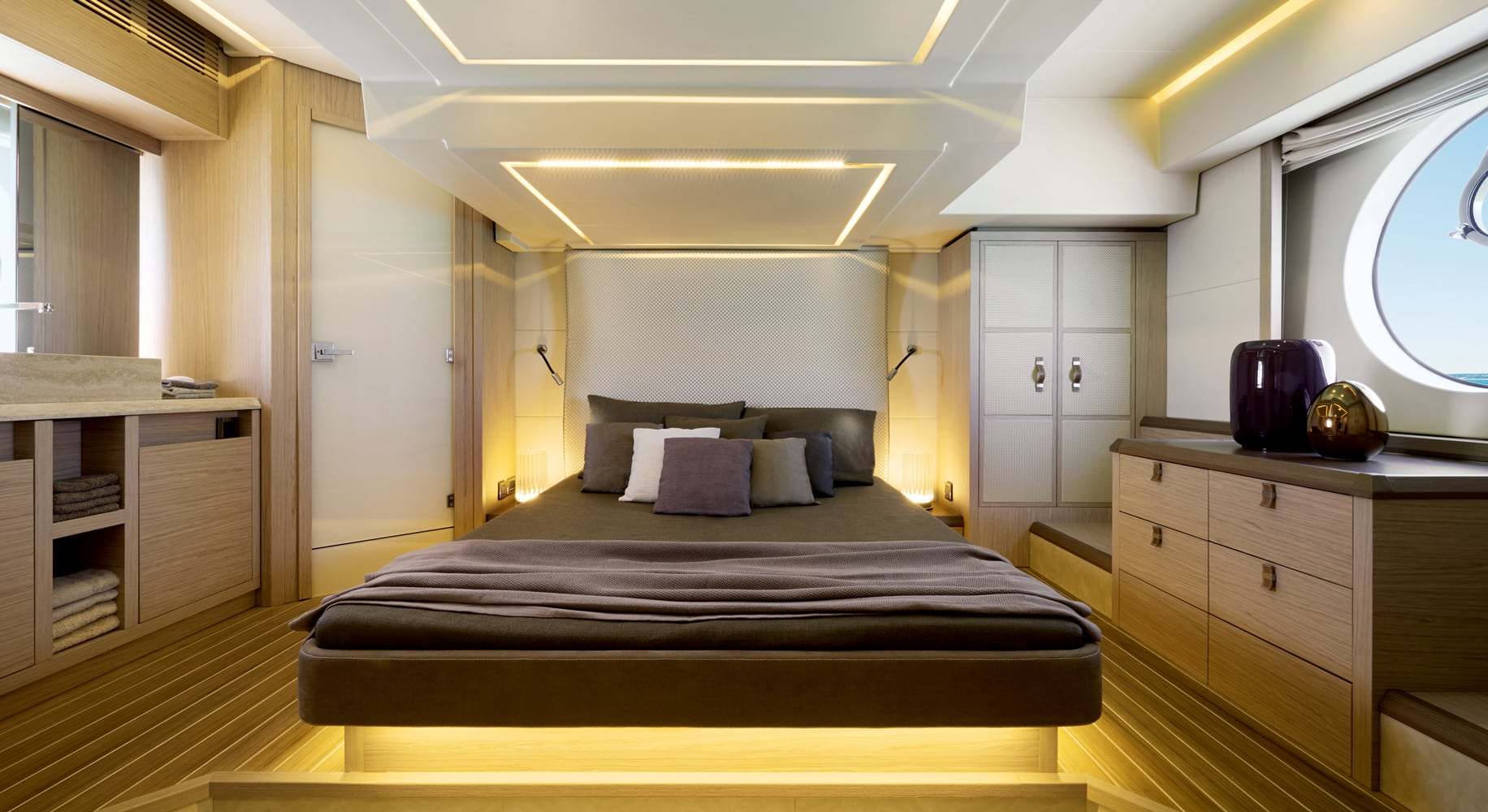 Monaco 60 yacht master bedroom with large windows and elegant lighting