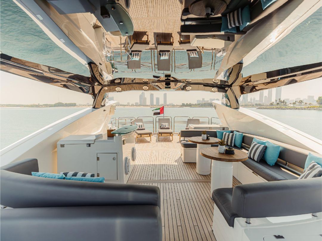 Interior salon of Notorious luxury yacht with seating and panoramic windows
