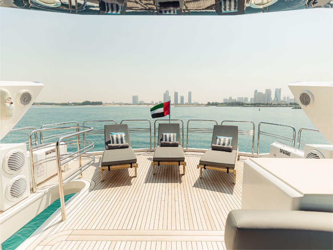 Forward deck seating area on Notorious yacht with ocean views