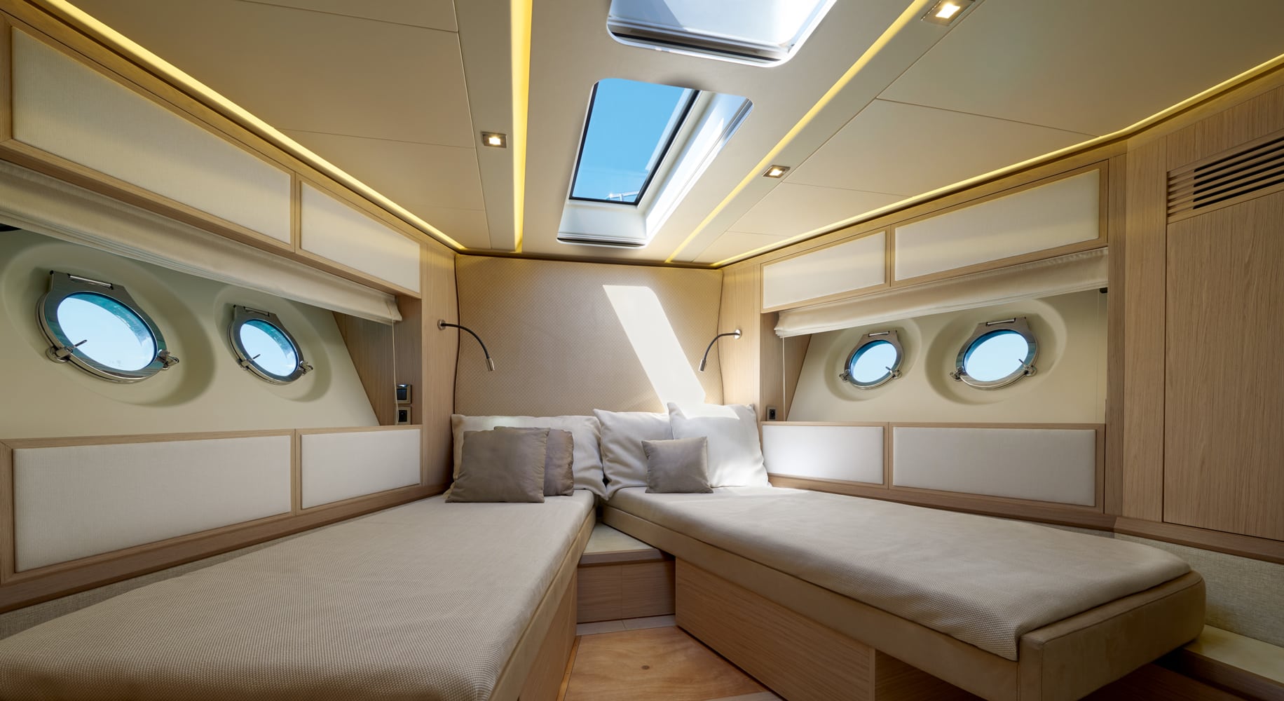 Monaco 60 yacht bedroom with skylight ceiling and modern furnishings