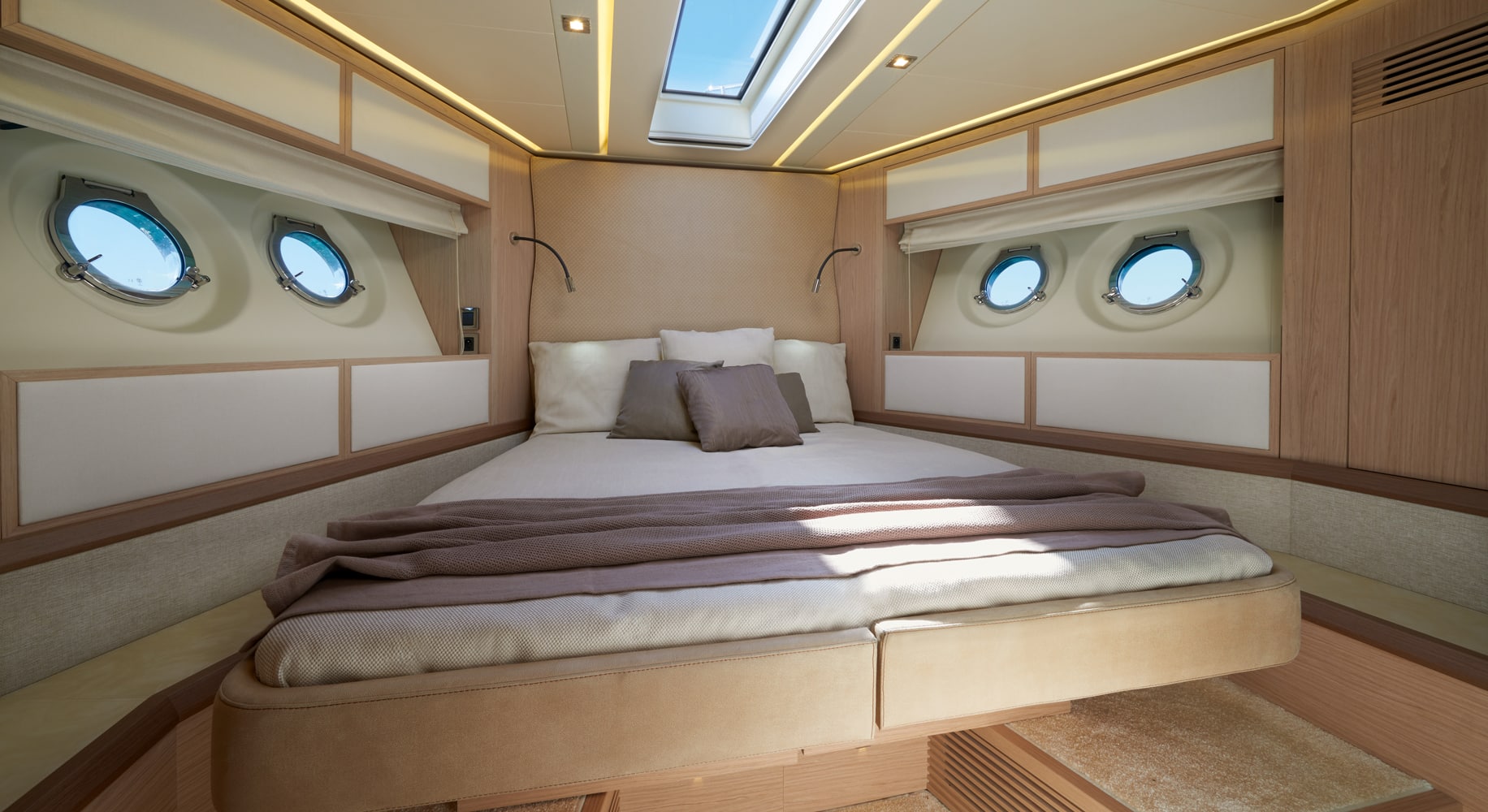 Monaco 60 yacht master suite with elegant lighting and large windows