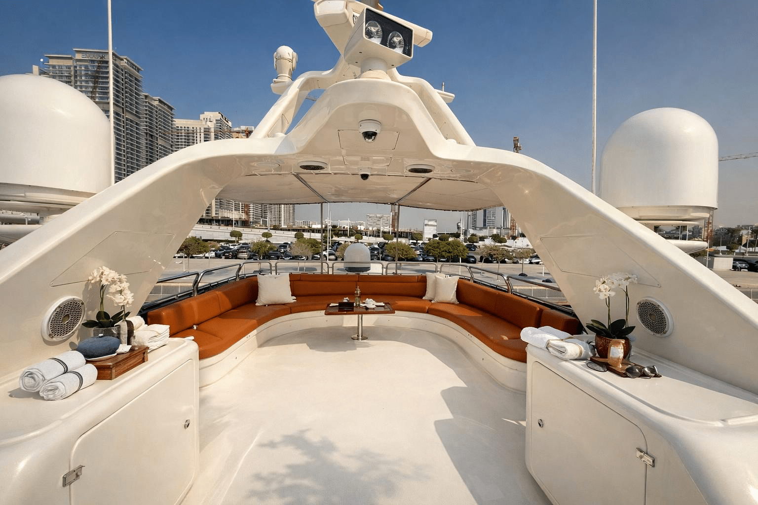 Benetti 120 sun deck lounge with curved seating and open sky design