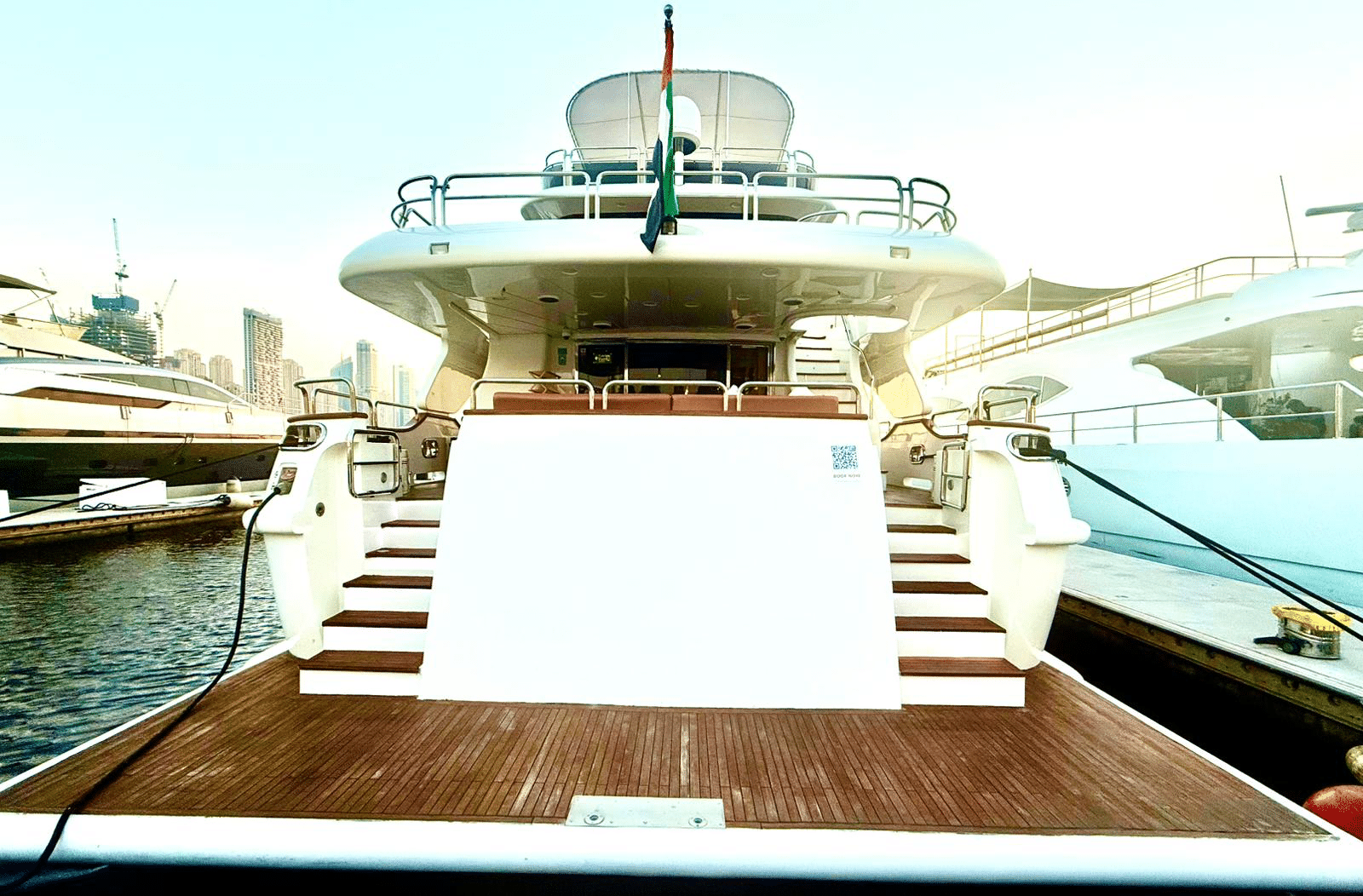Benetti 120 aft deck with teak flooring and stair access to upper deck