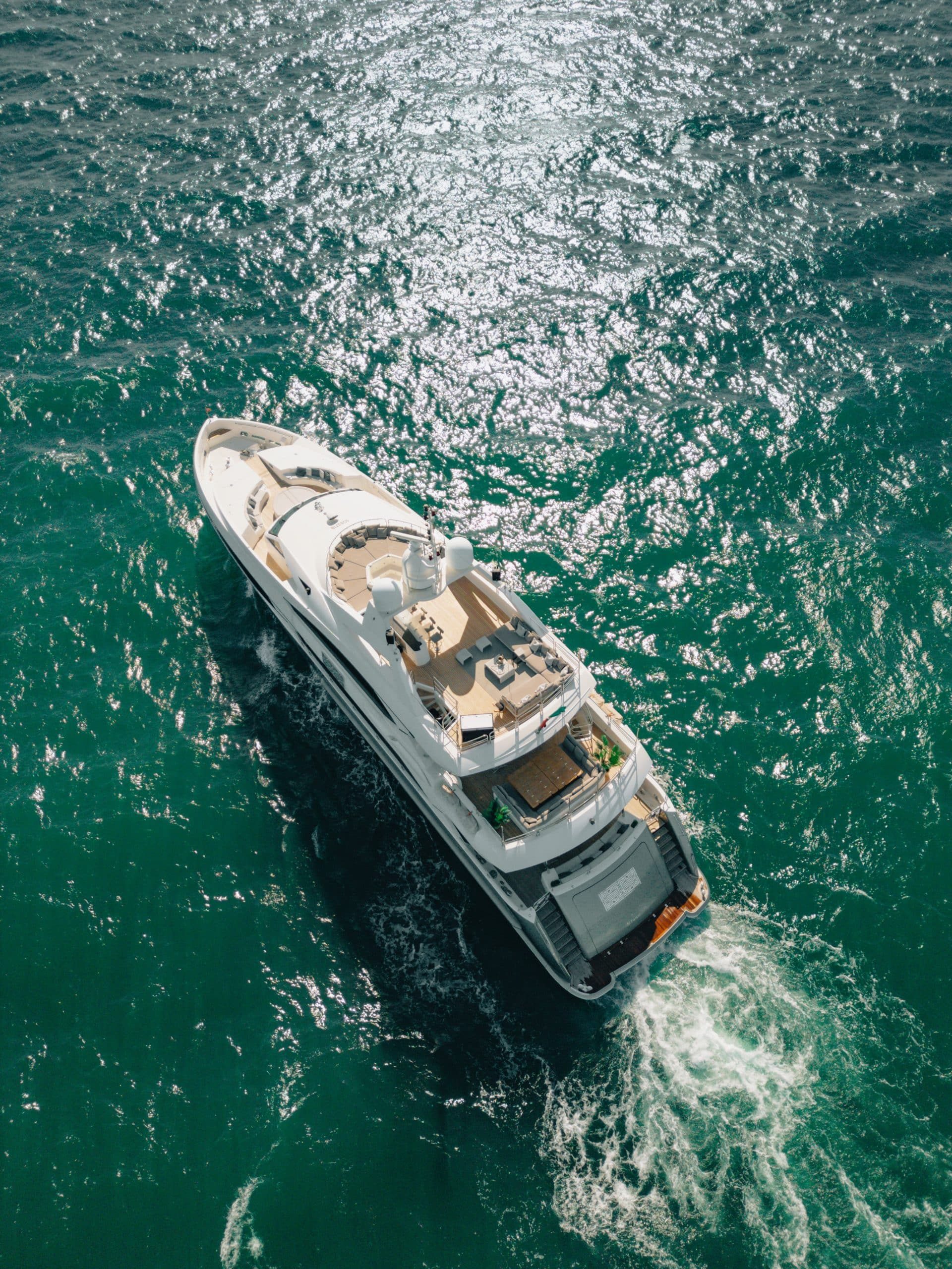 Aurora 130 superyacht aerial view in turquoise waters