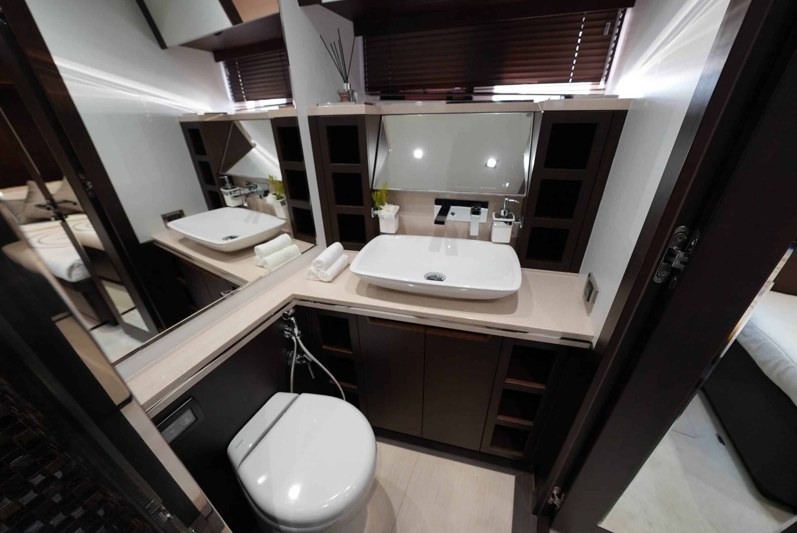 Galeon 780 F1 yacht bathroom with modern sink, mirror, and compact luxury layout