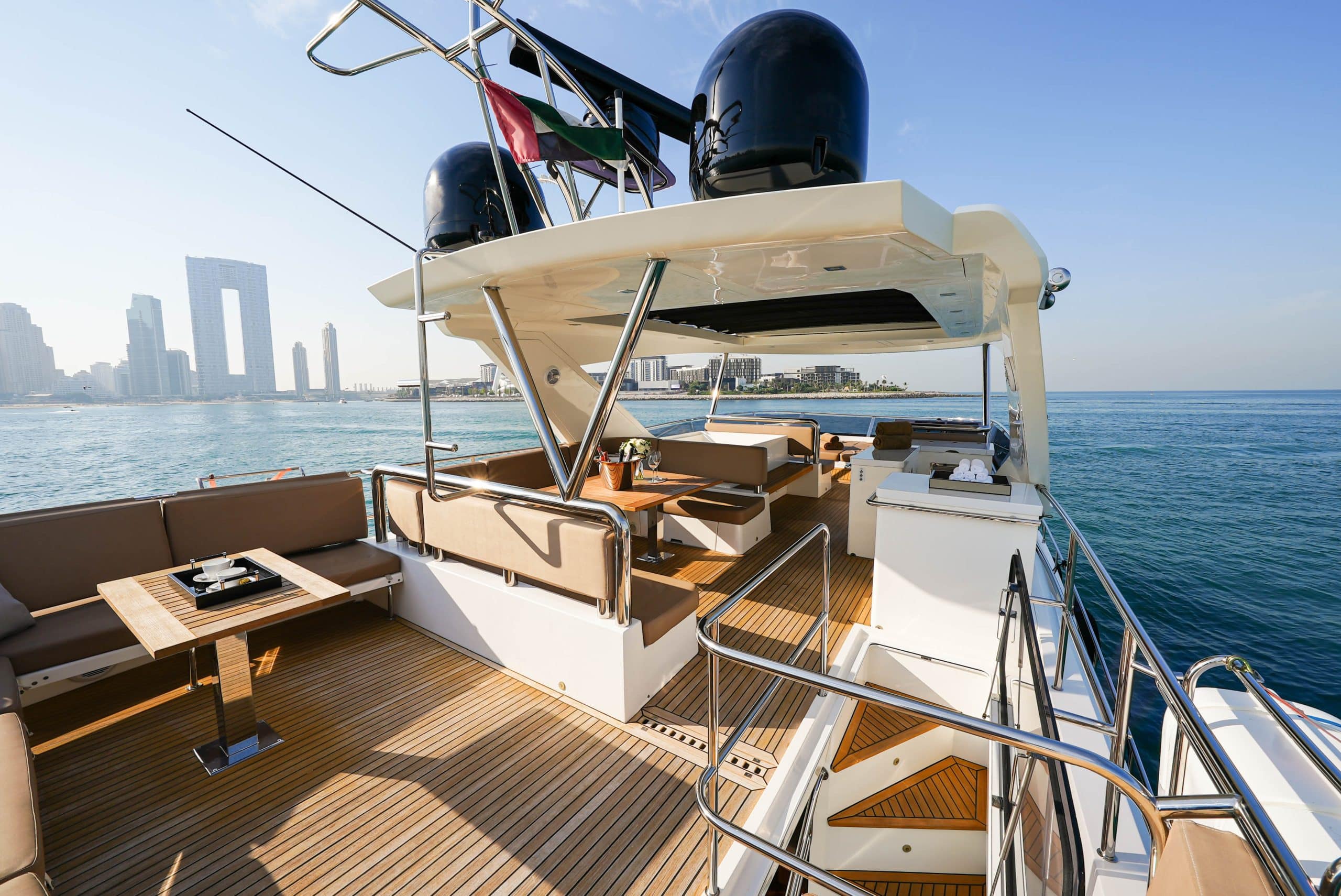Galeon 780 F1 flybridge lounge with sunshade, seating area, and teak decking