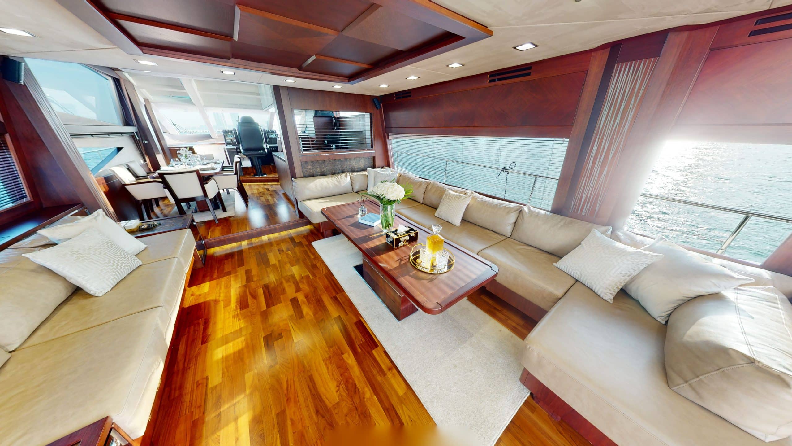 Galeon 780 F1 luxury salon lounge with L-shaped sofa and modern wood finishes